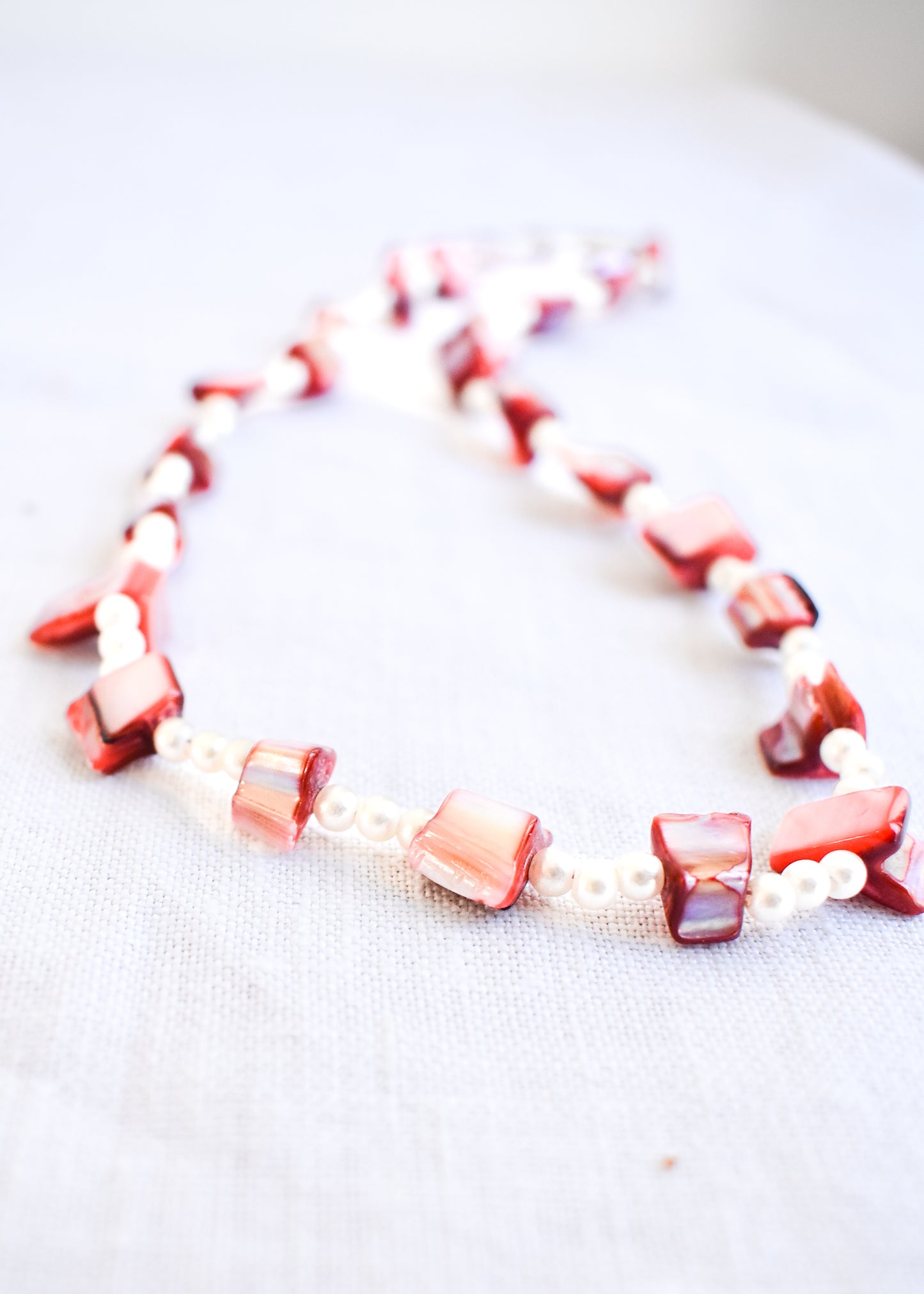 Funky red pearlescent beaded necklace