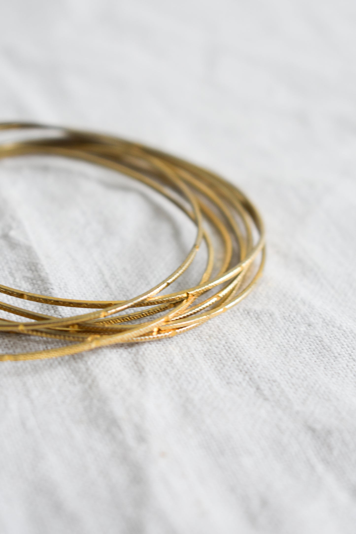 Golden bangles, set of 7