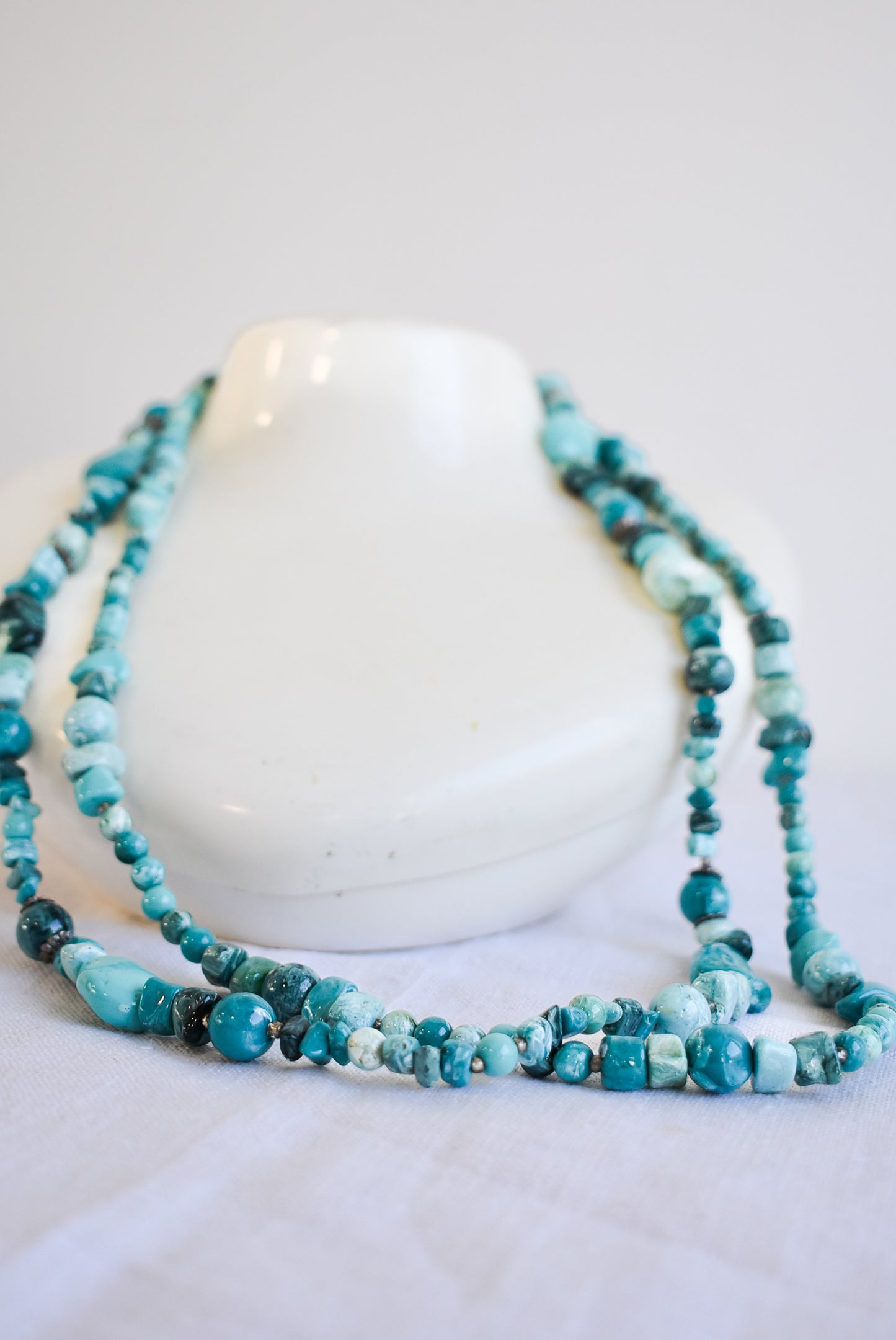 Eye-catching teal plastic stone beaded necklace