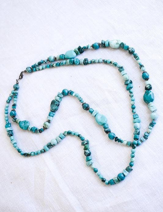 Eye-catching teal plastic stone beaded necklace