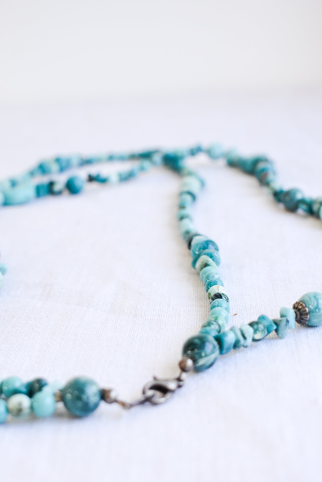 Eye-catching teal plastic stone beaded necklace