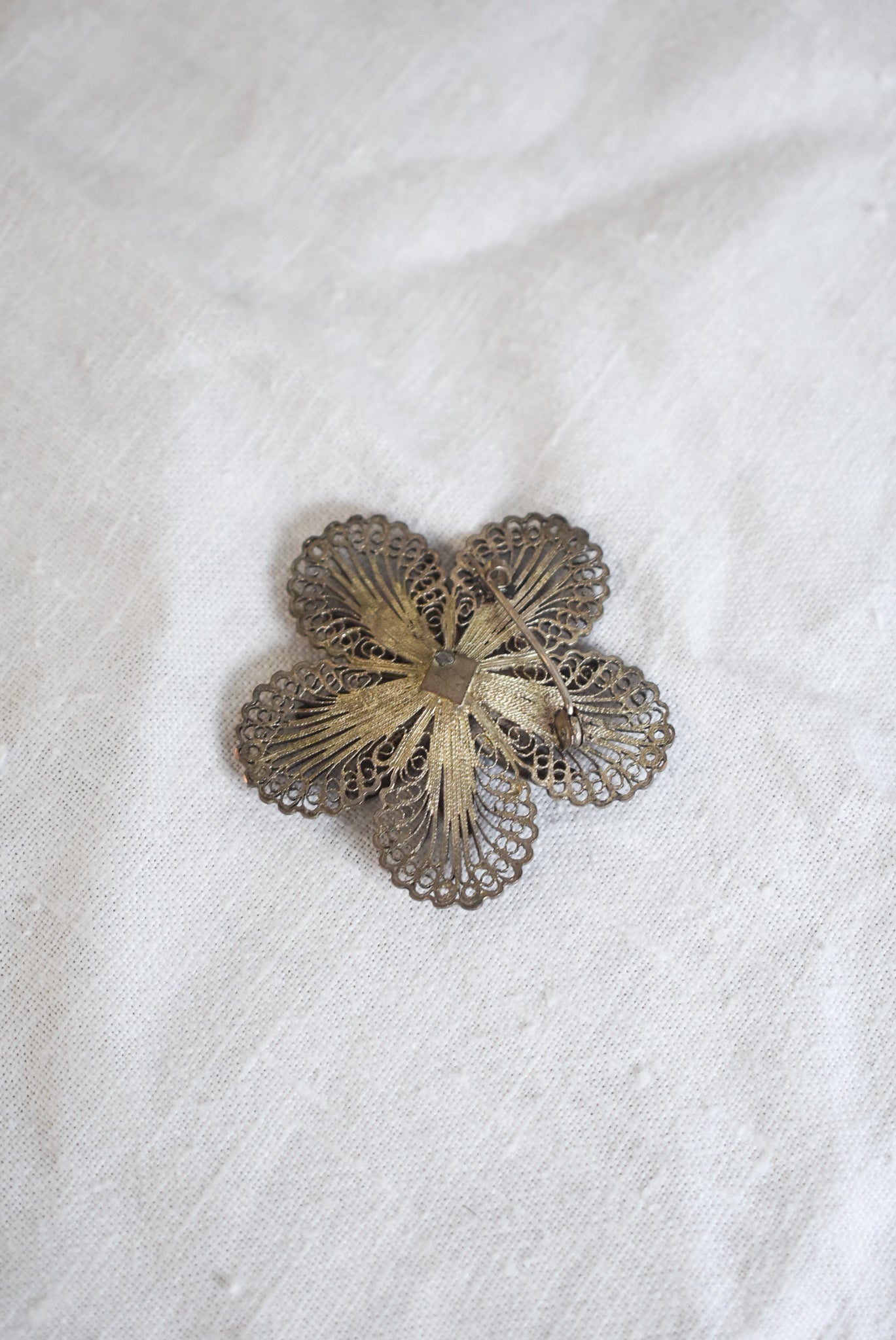 Vintage silver filigree flower brooch