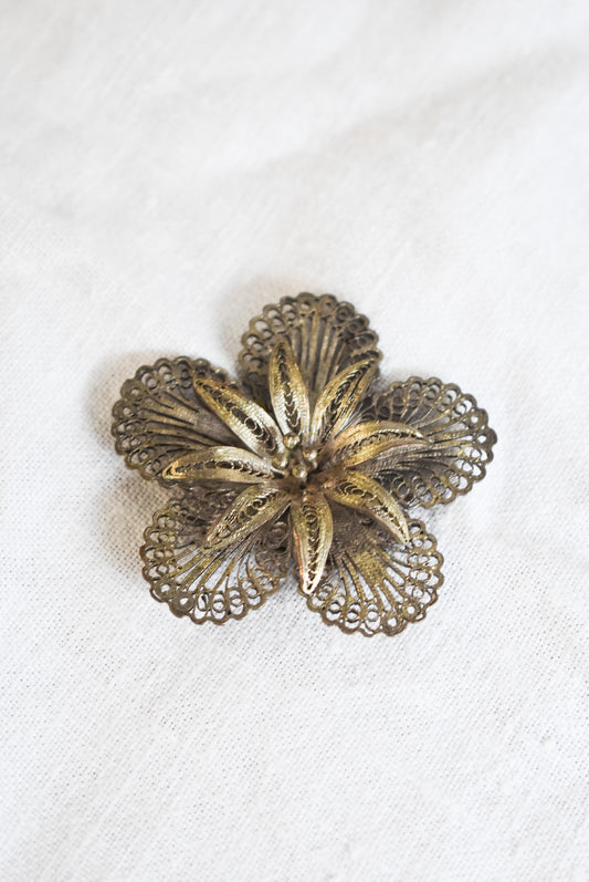 Vintage silver filigree flower brooch