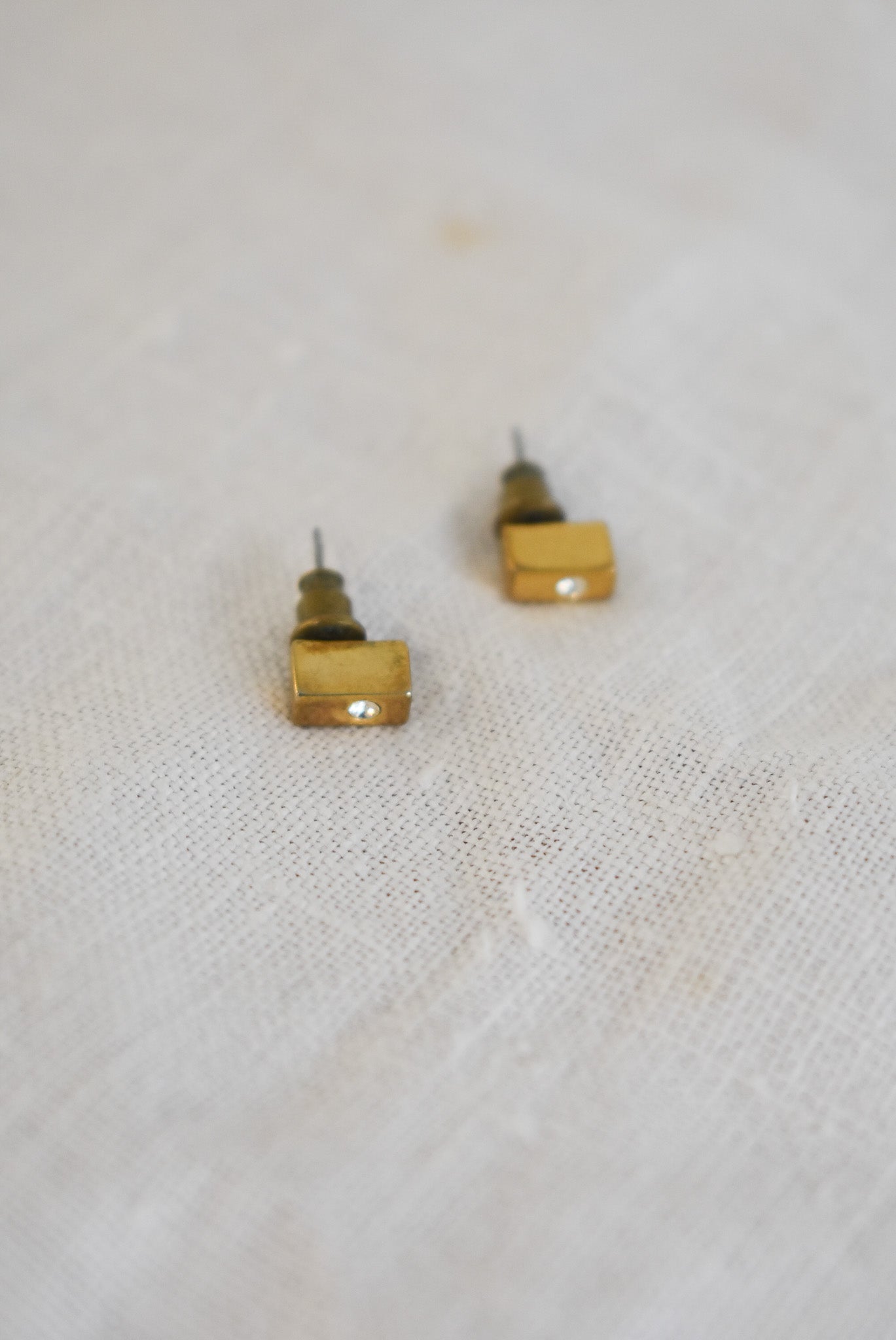 Golden cuboid stud earrings