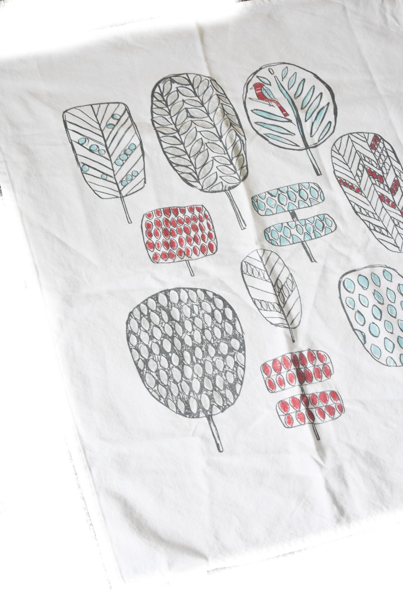 Funky trees tea towel