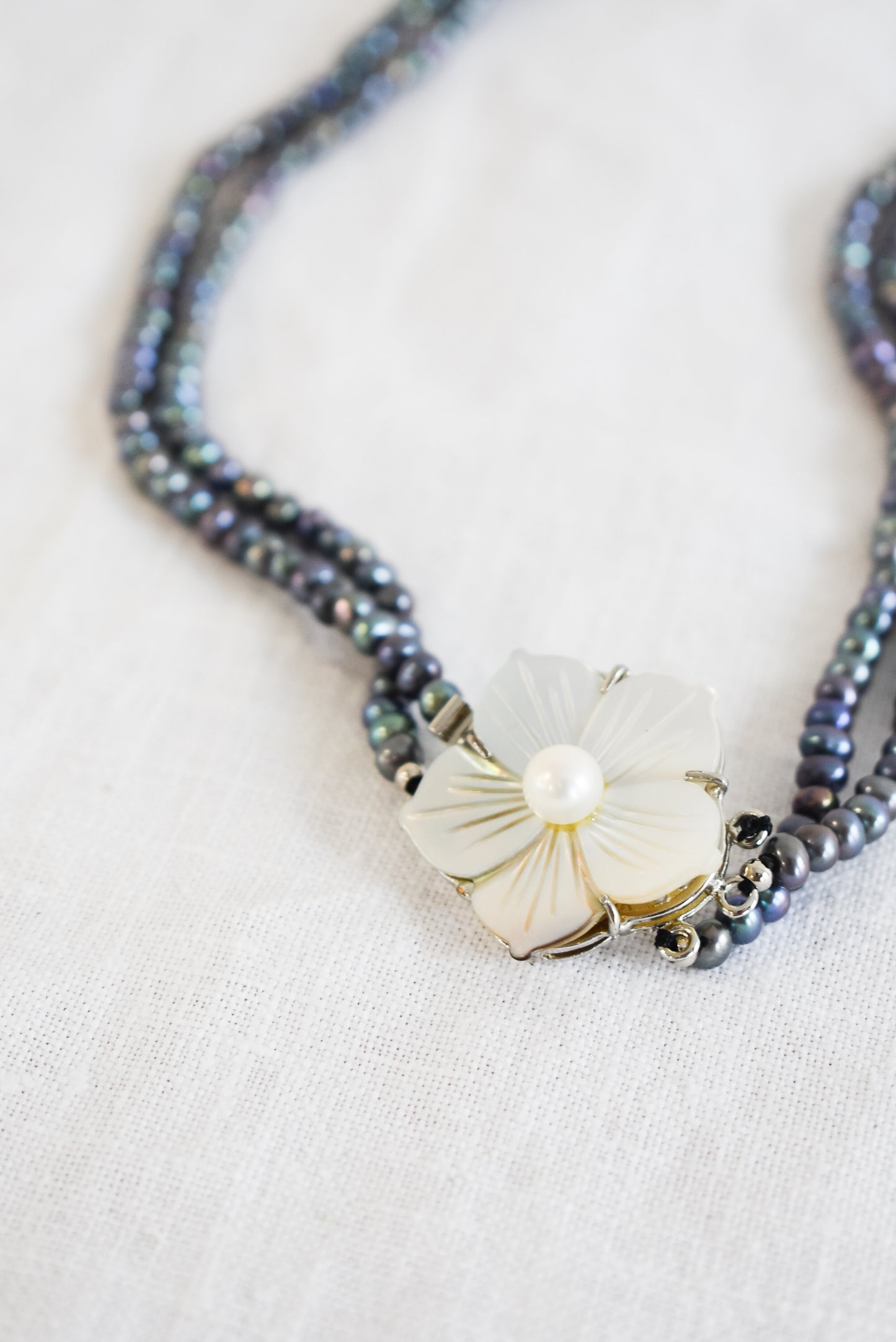 Freshwater pearl necklace with flower clasp