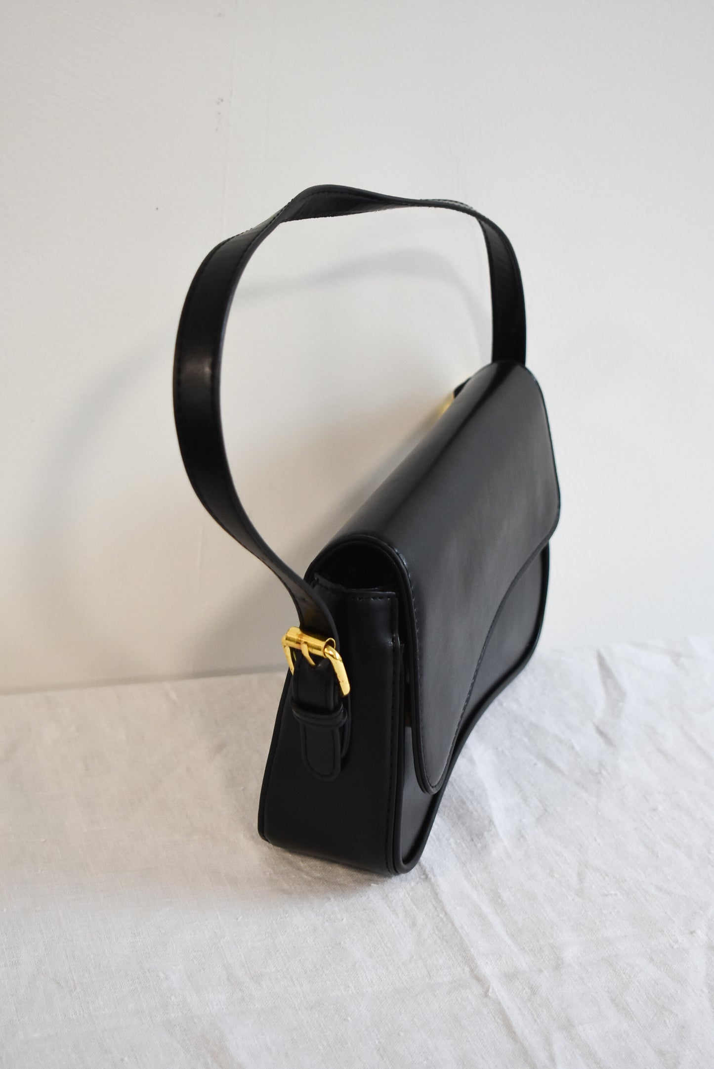 Super cute faux leather black evening bag