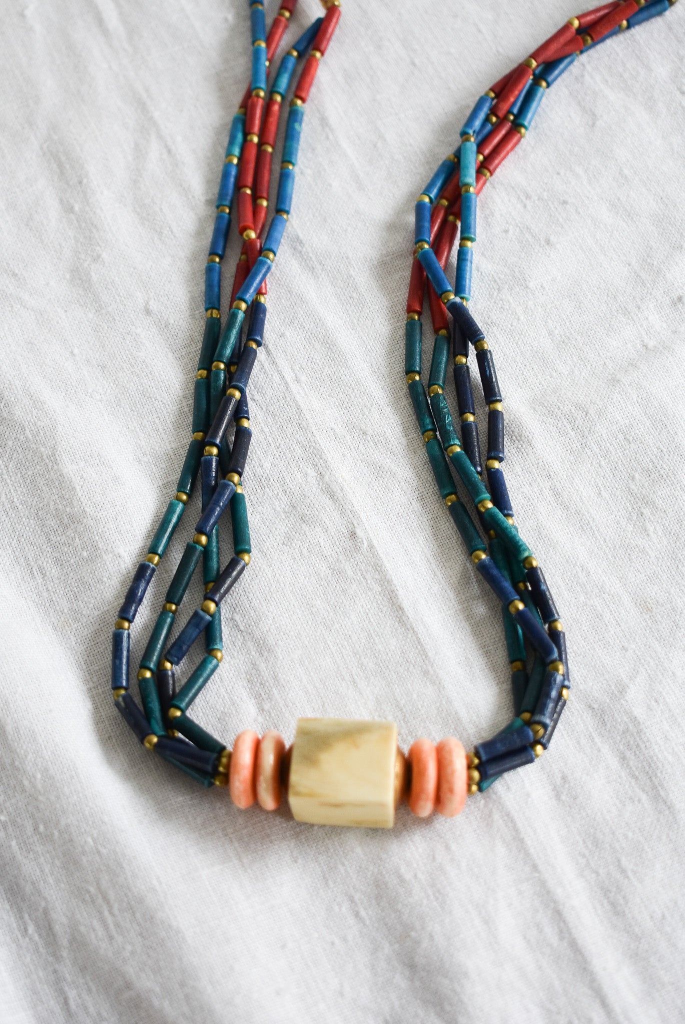 Statement bone, wood & brass beaded necklace