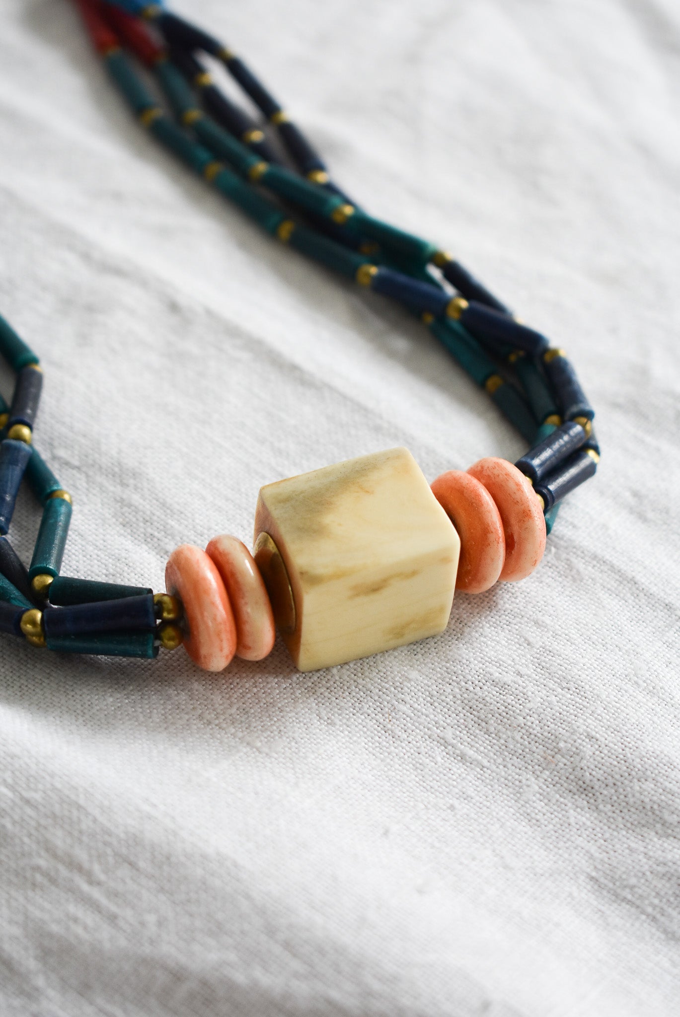 Statement bone, wood & brass beaded necklace