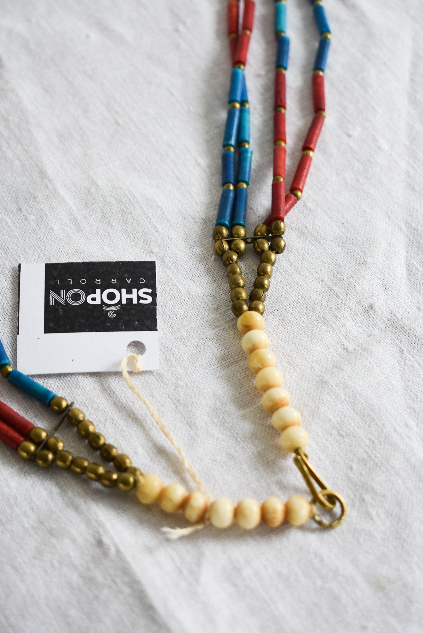 Statement bone, wood & brass beaded necklace