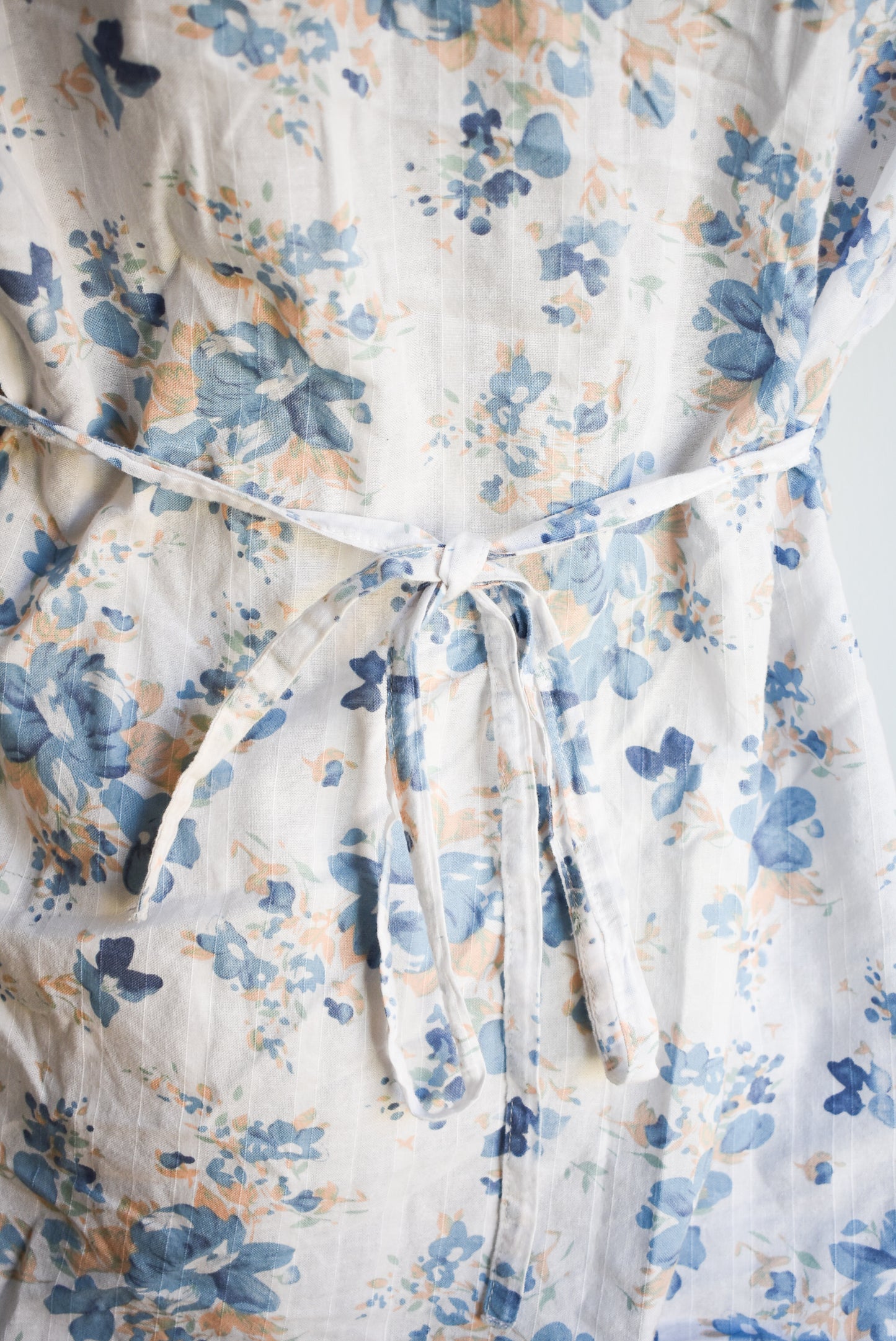 White and blue floral short sleeved blouse, M