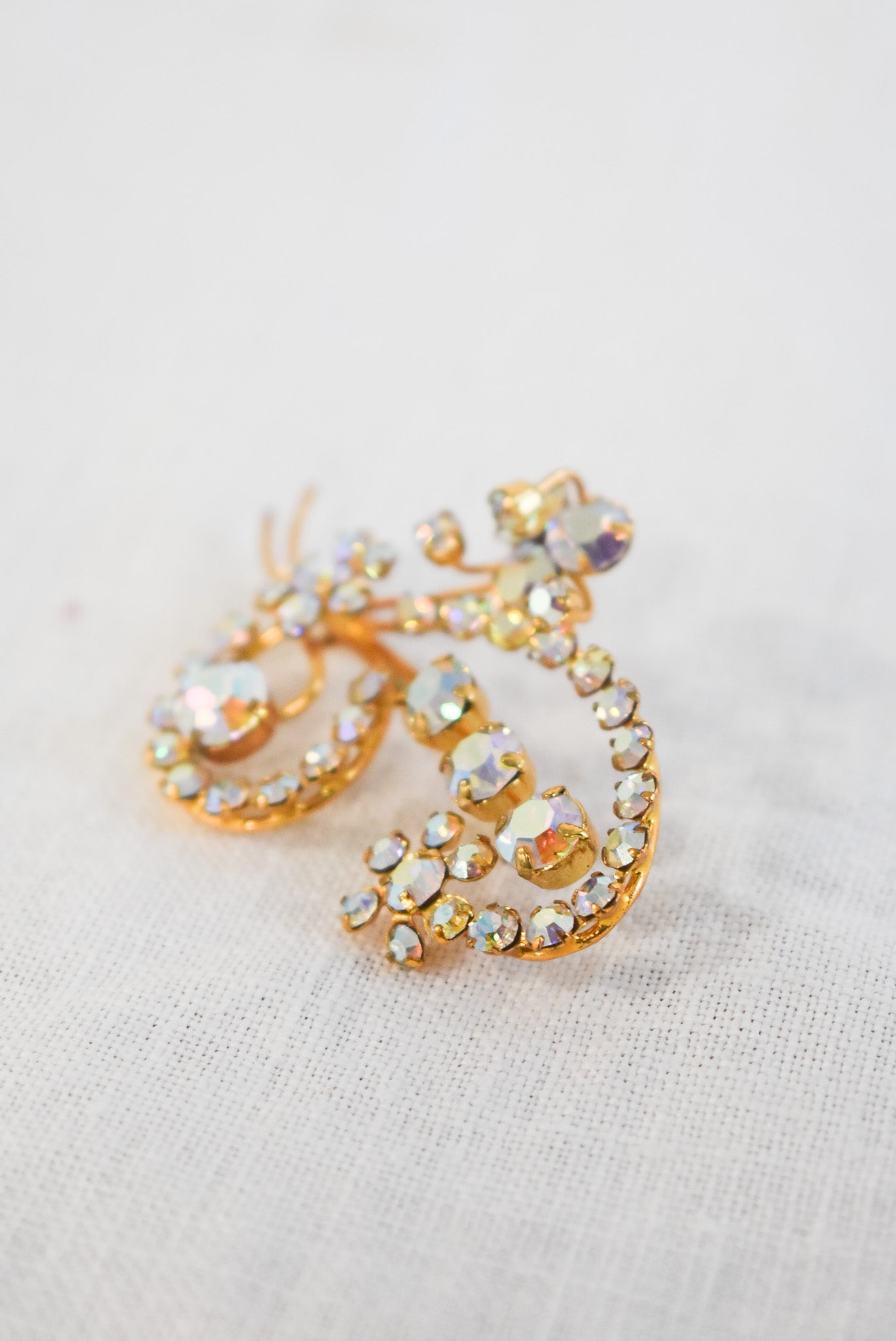 Glitzy golden brooch