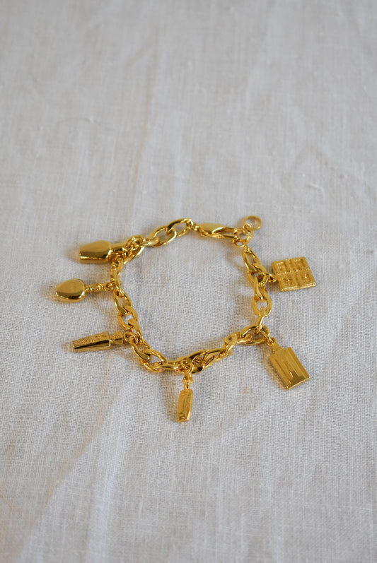 Vintage 1990's Givenchy perfume bottle charm bracelet