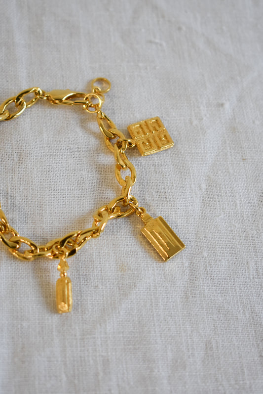 Vintage 1990's Givenchy perfume bottle charm bracelet