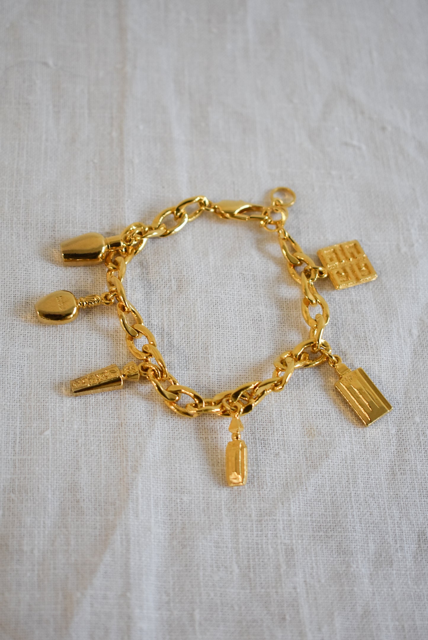 Vintage 1990's Givenchy perfume bottle charm bracelet