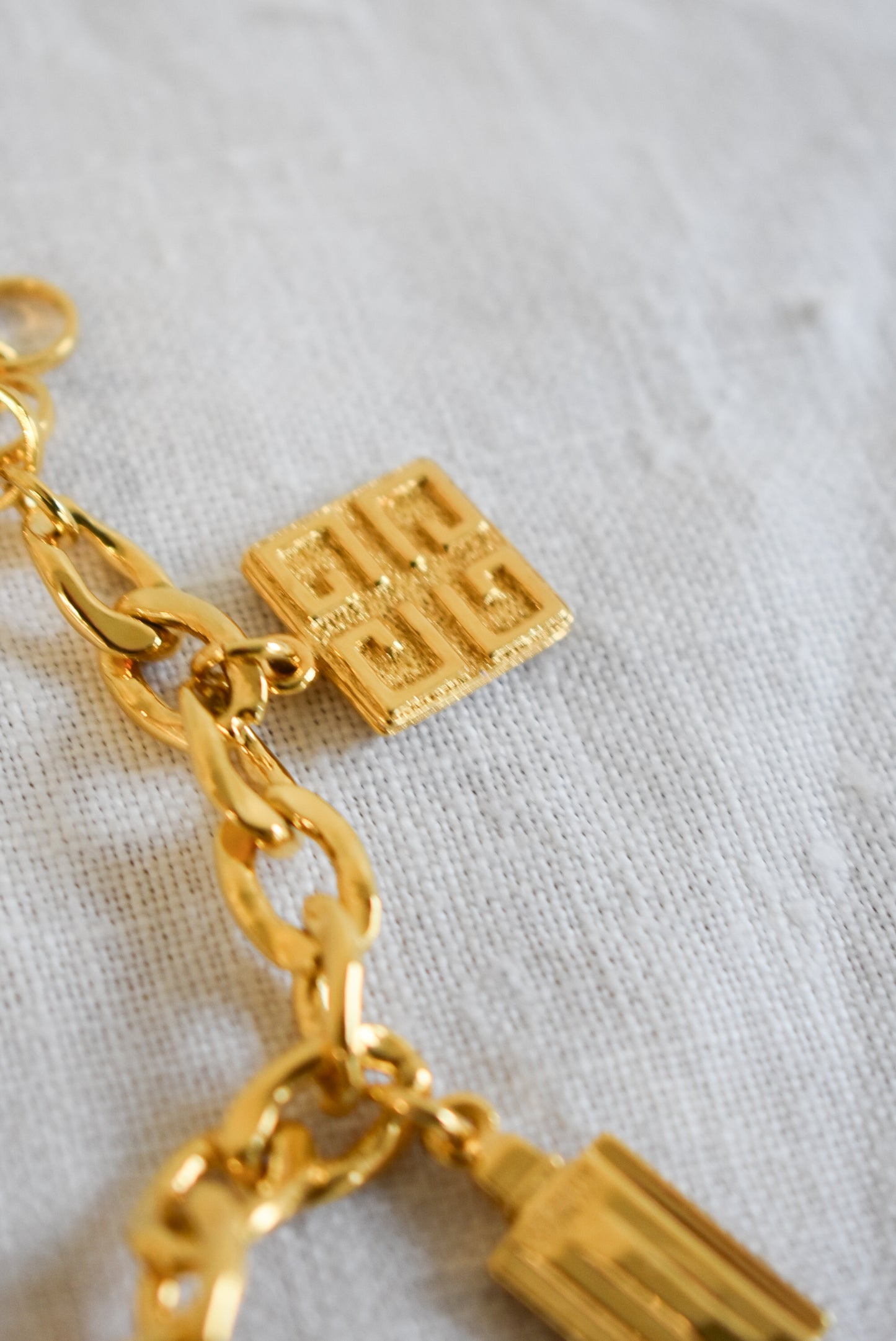 Vintage 1990's Givenchy perfume bottle charm bracelet