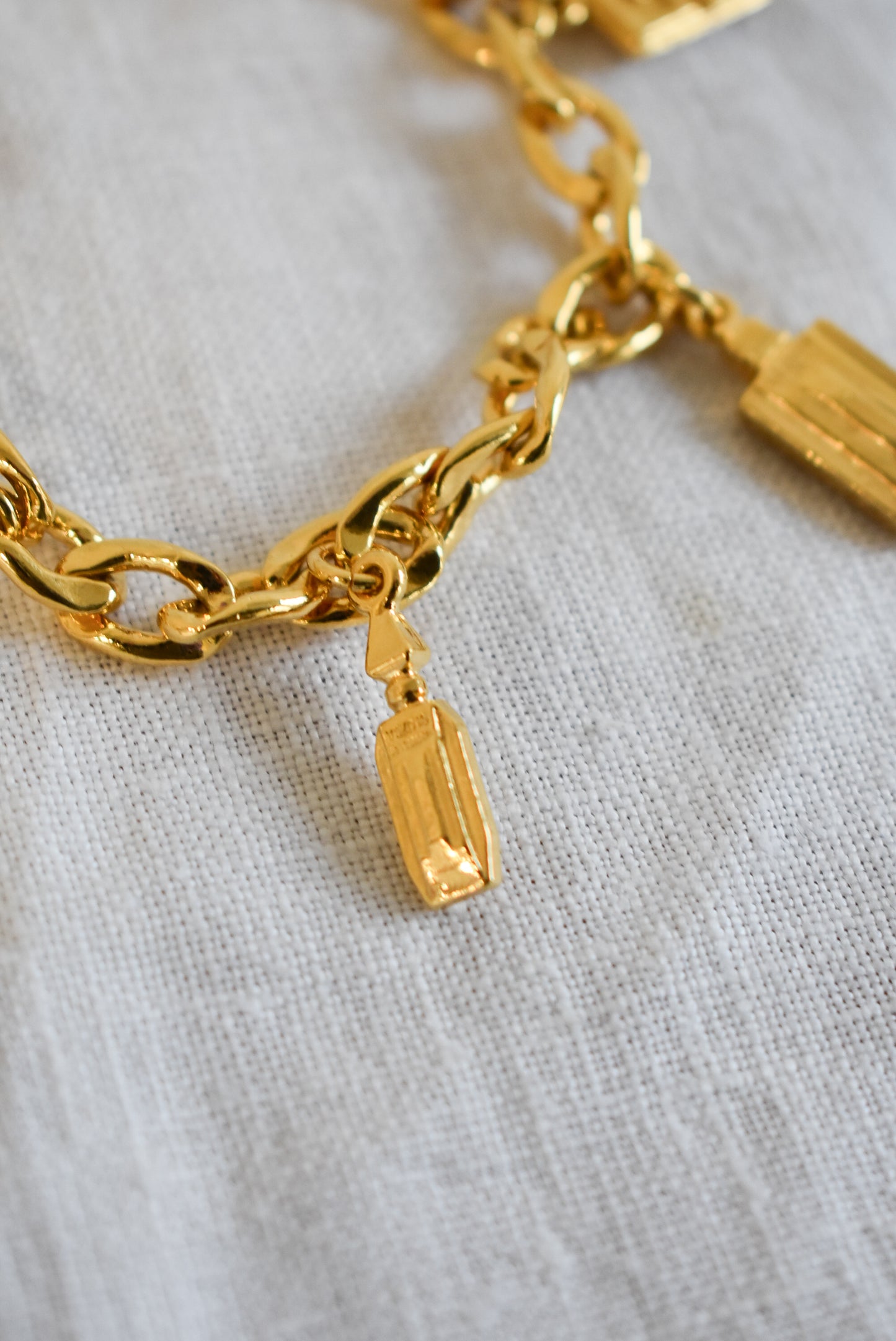 Vintage 1990's Givenchy perfume bottle charm bracelet