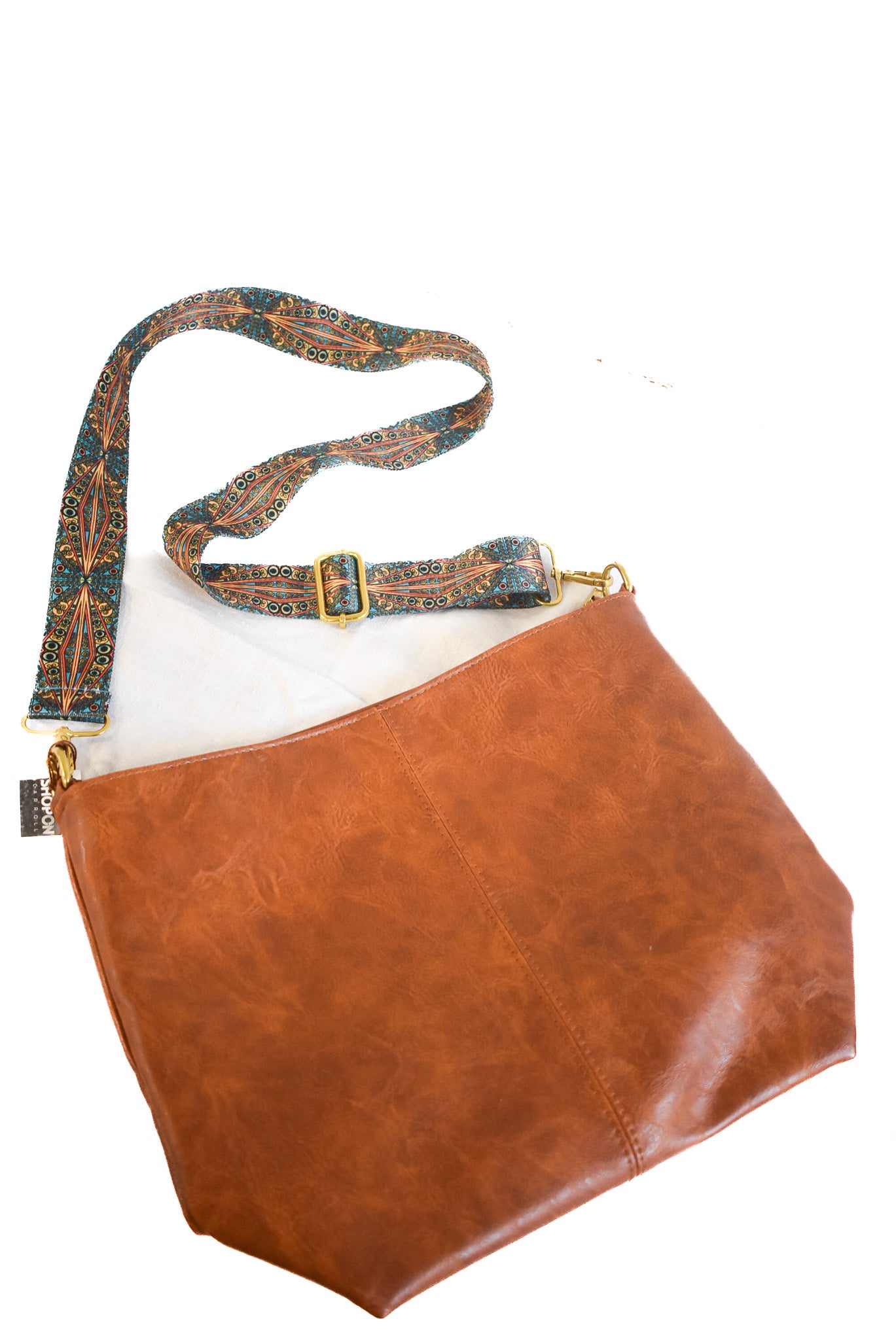 Faux leather handbag with funky strap