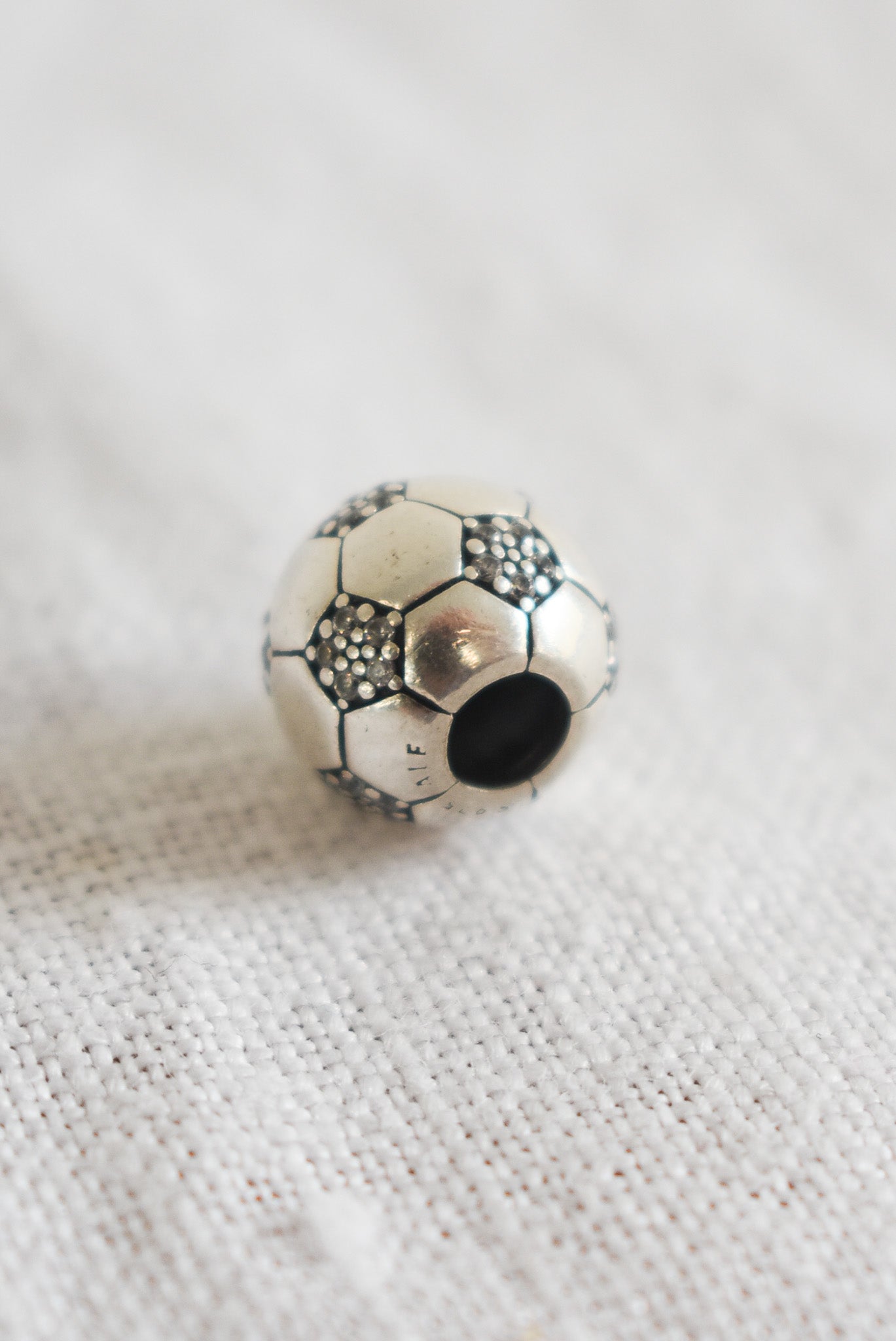 Sterling silver + diamond soccer charm