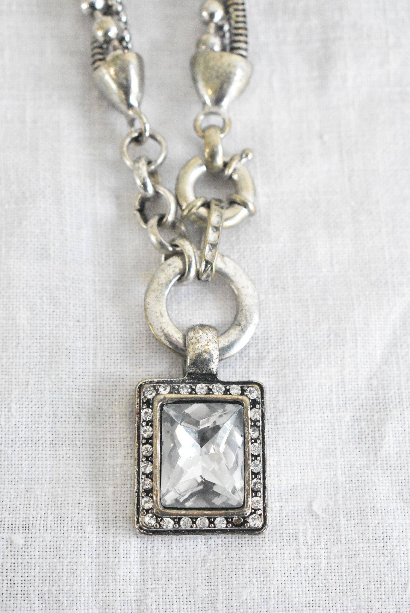 Chunky silver "heavy metal" necklace with square glass pendant