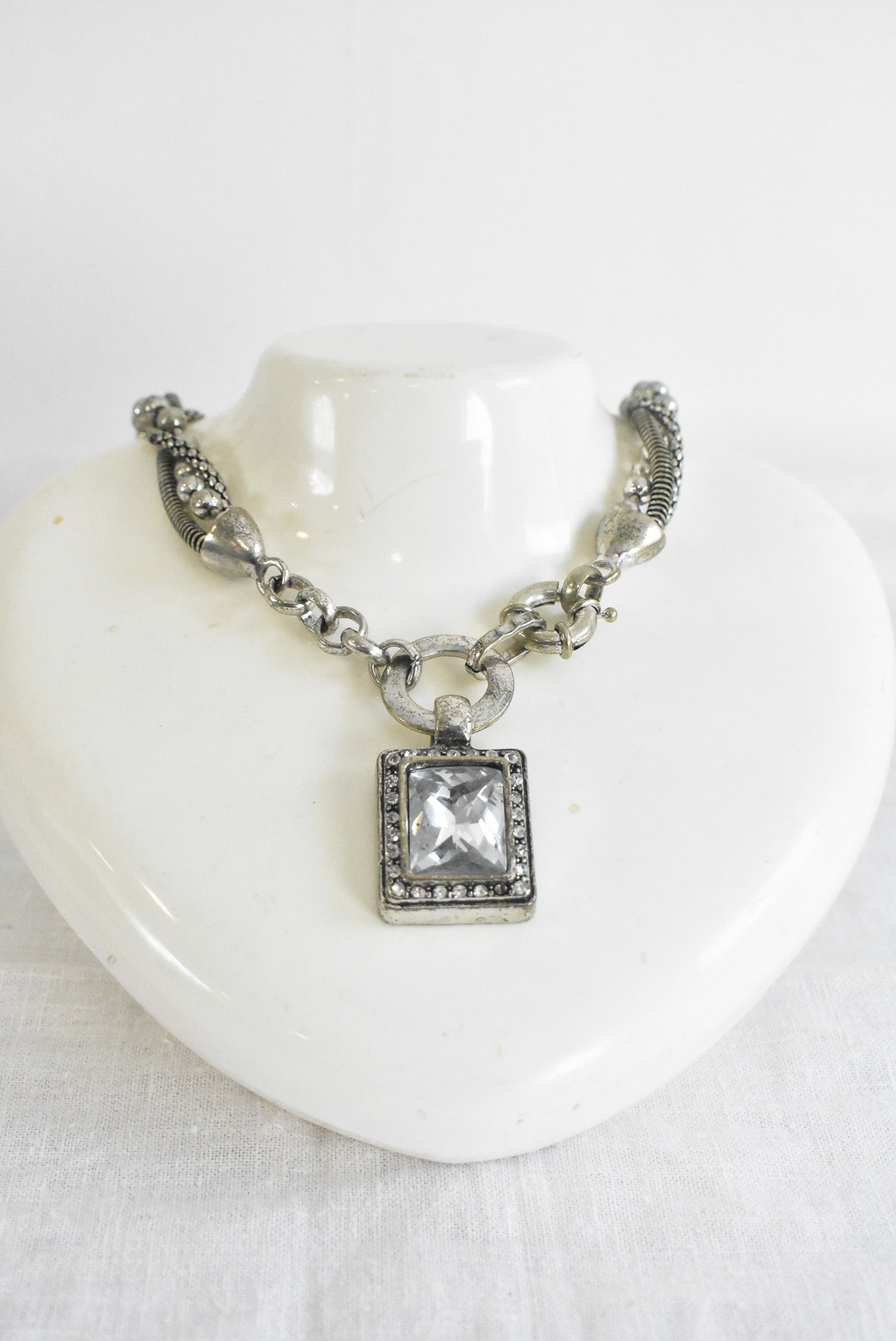 Chunky silver "heavy metal" necklace with square glass pendant