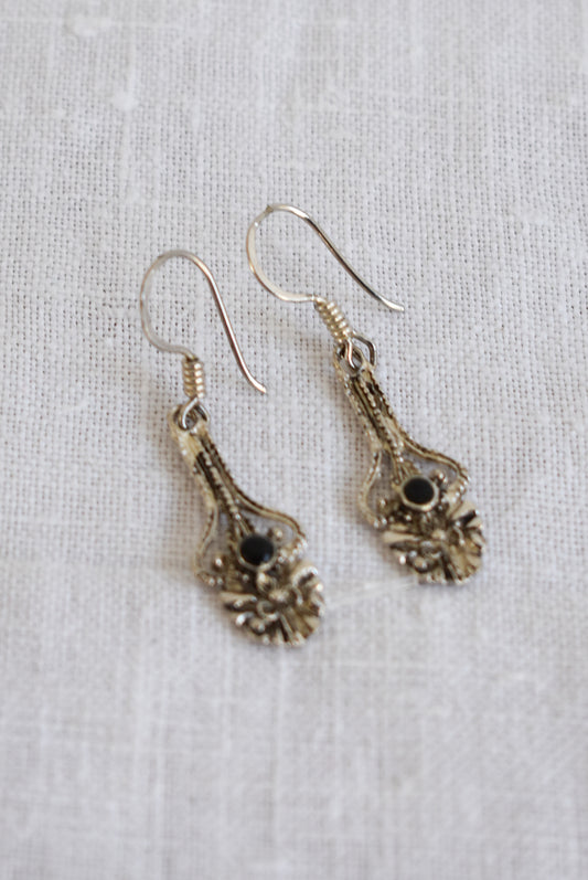 Ornate silver earrings