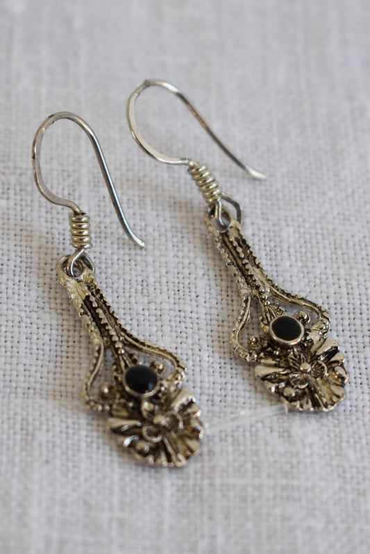 Ornate silver earrings