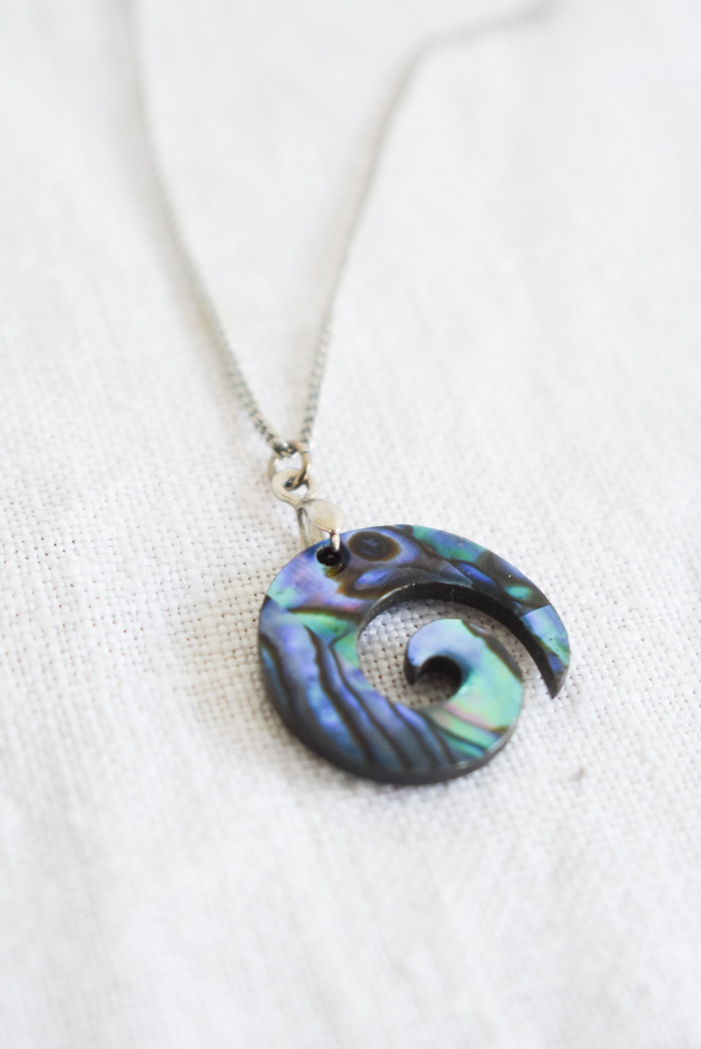 Wood + Paua Koru necklace