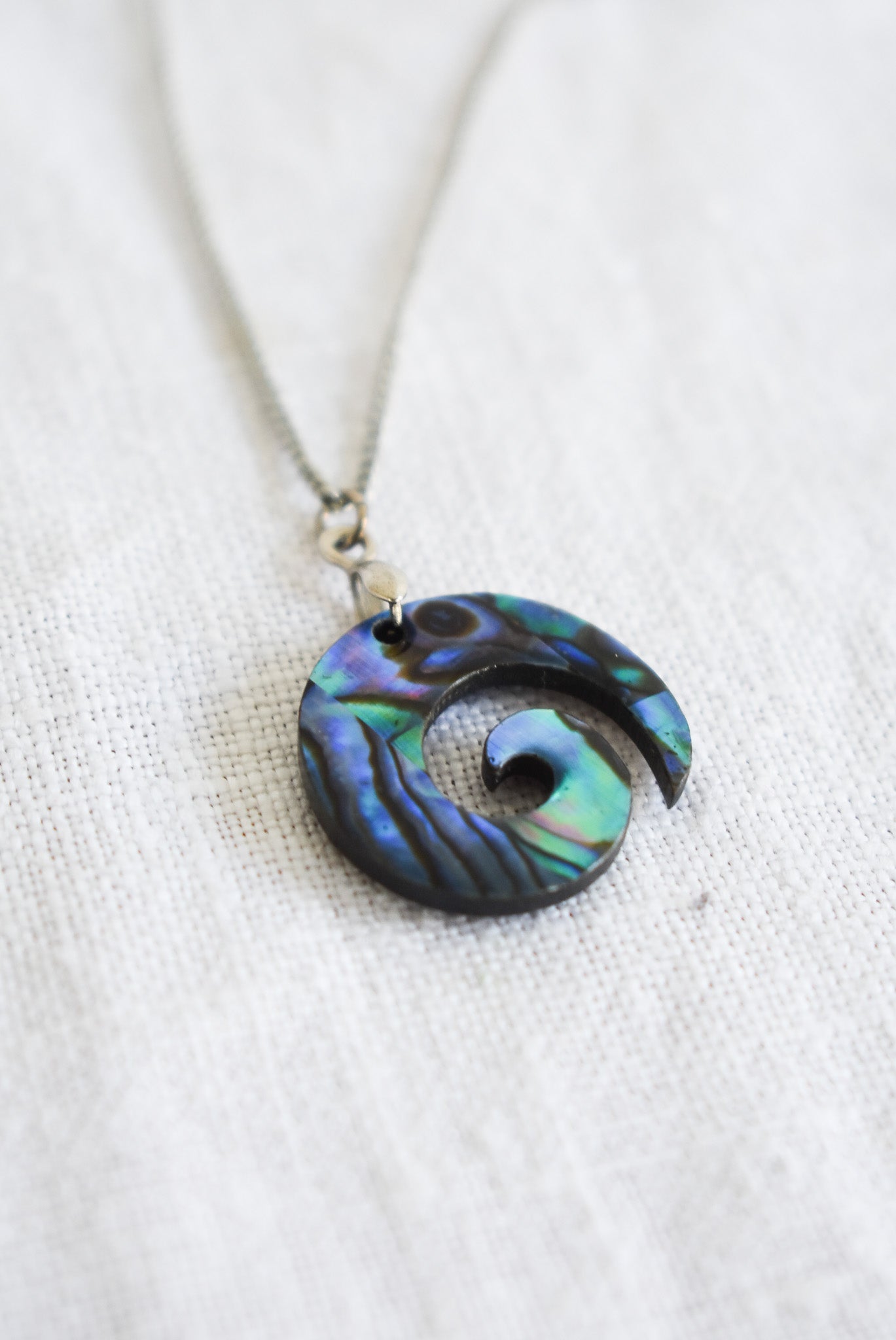 Wood + Paua Koru necklace