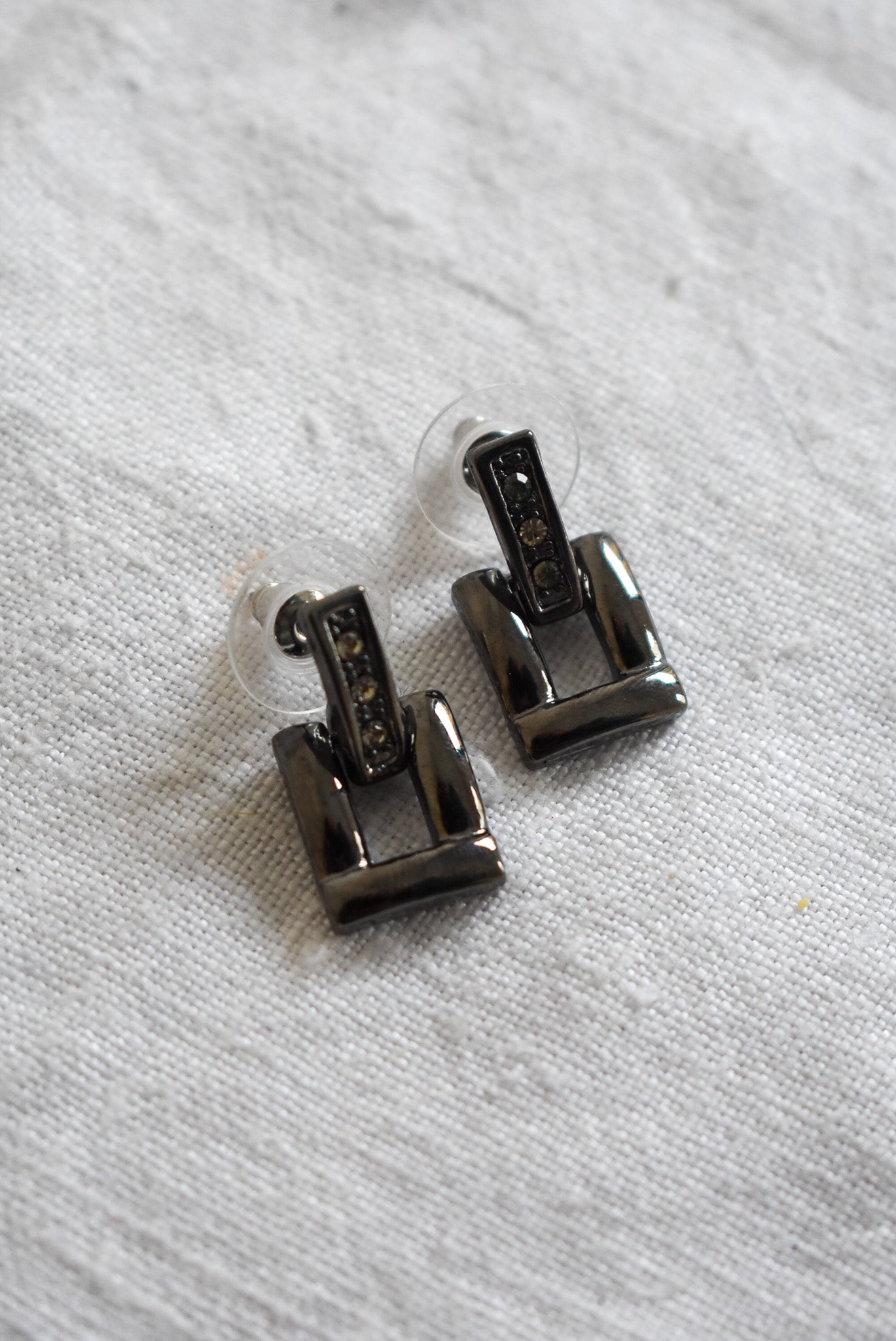 Dangly buckle studs