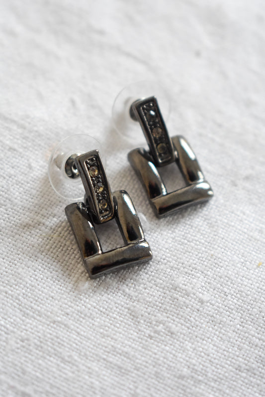 Dangly buckle studs