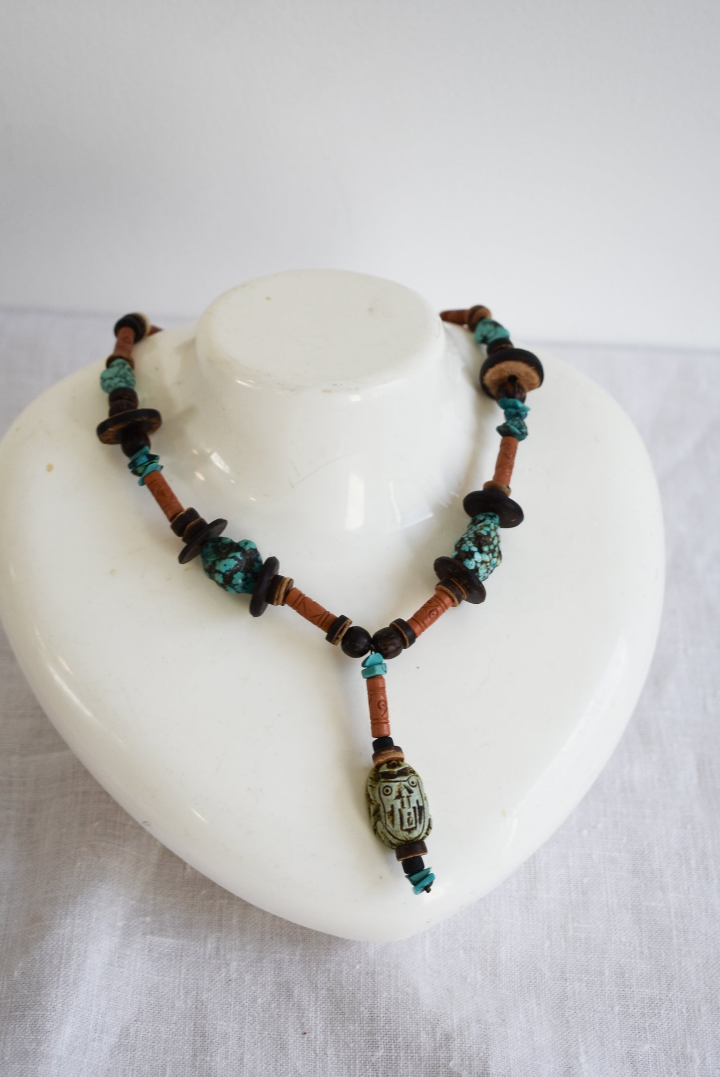 Wood and turquoise charm necklace