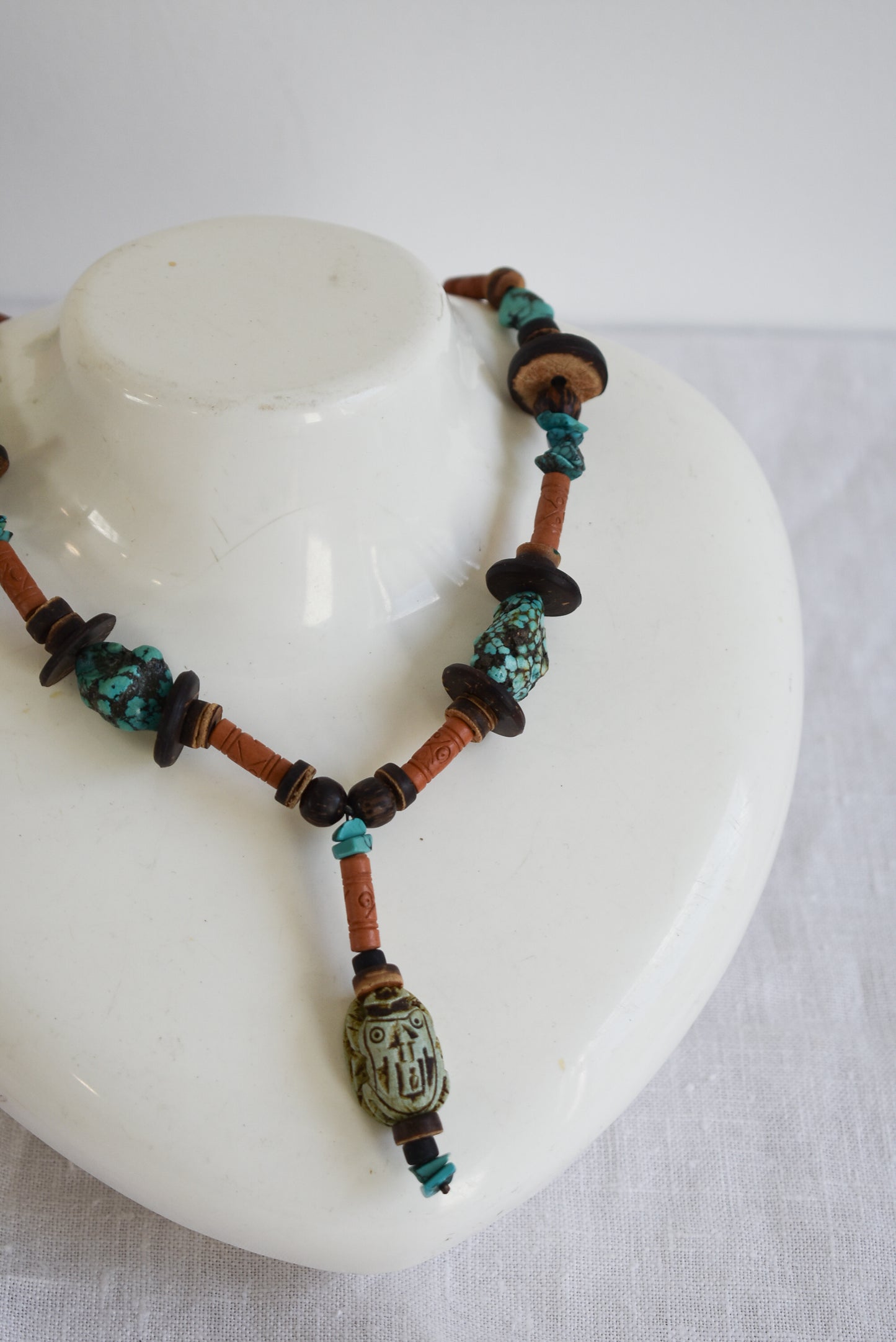 Wood and turquoise charm necklace