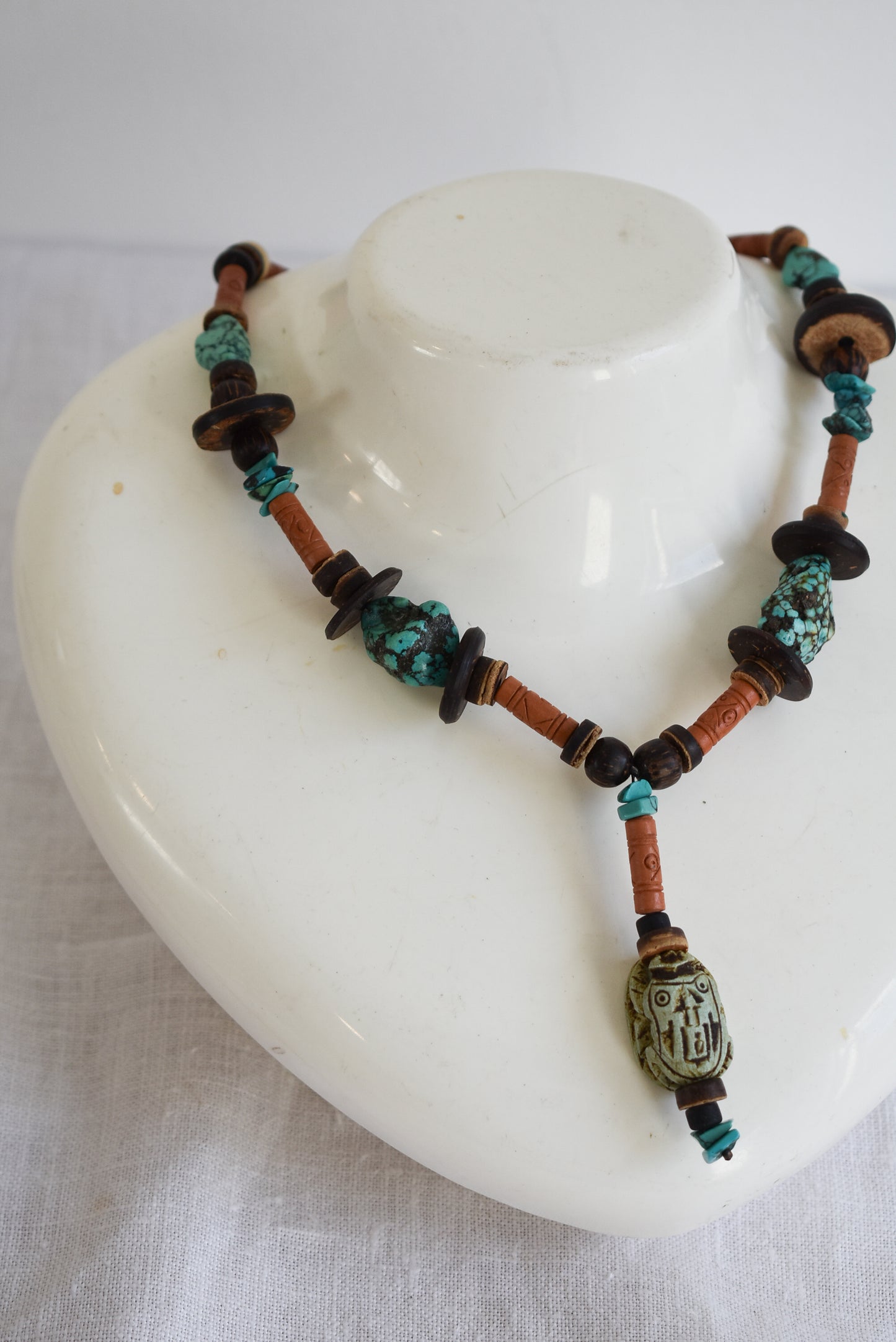 Wood and turquoise charm necklace