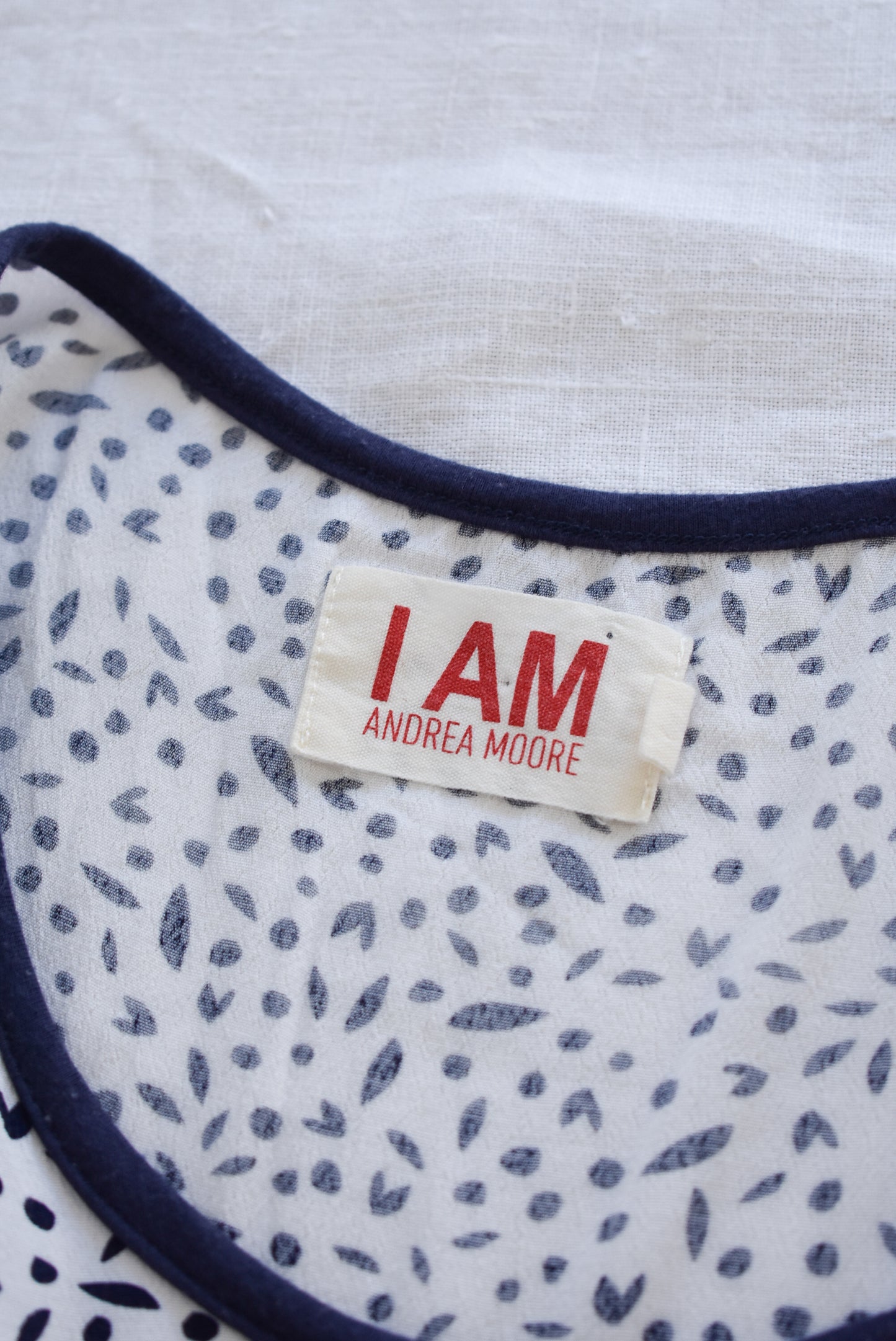 I AM ANDREA MOORE white & navy top, 8