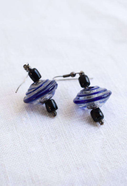 Blue and black glass swirly bead earrings