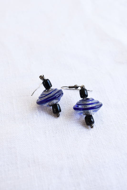 Blue and black glass swirly bead earrings