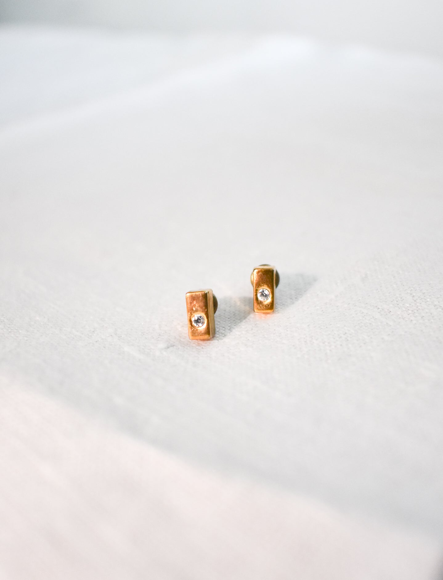 Gold coloured cuboid stud earrings