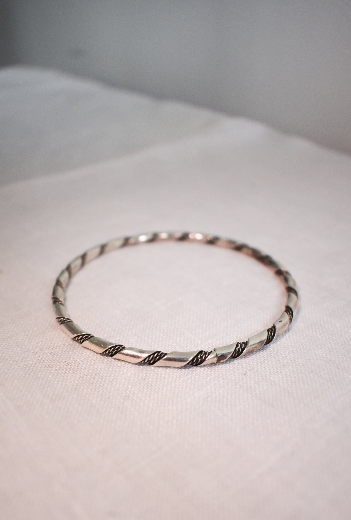 Silver chain detailed bangle