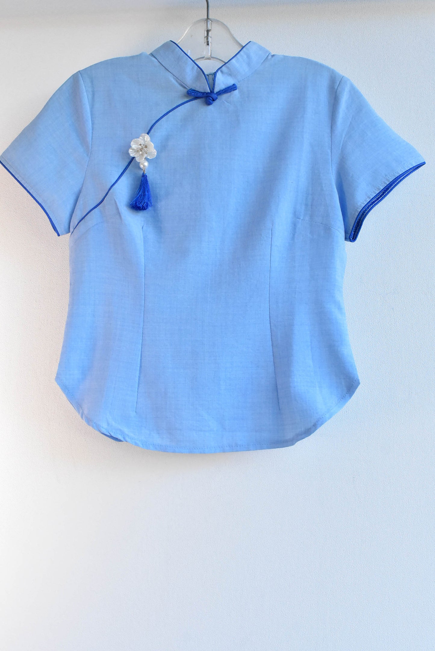 Gu Yitang light blue top with flower, size XS