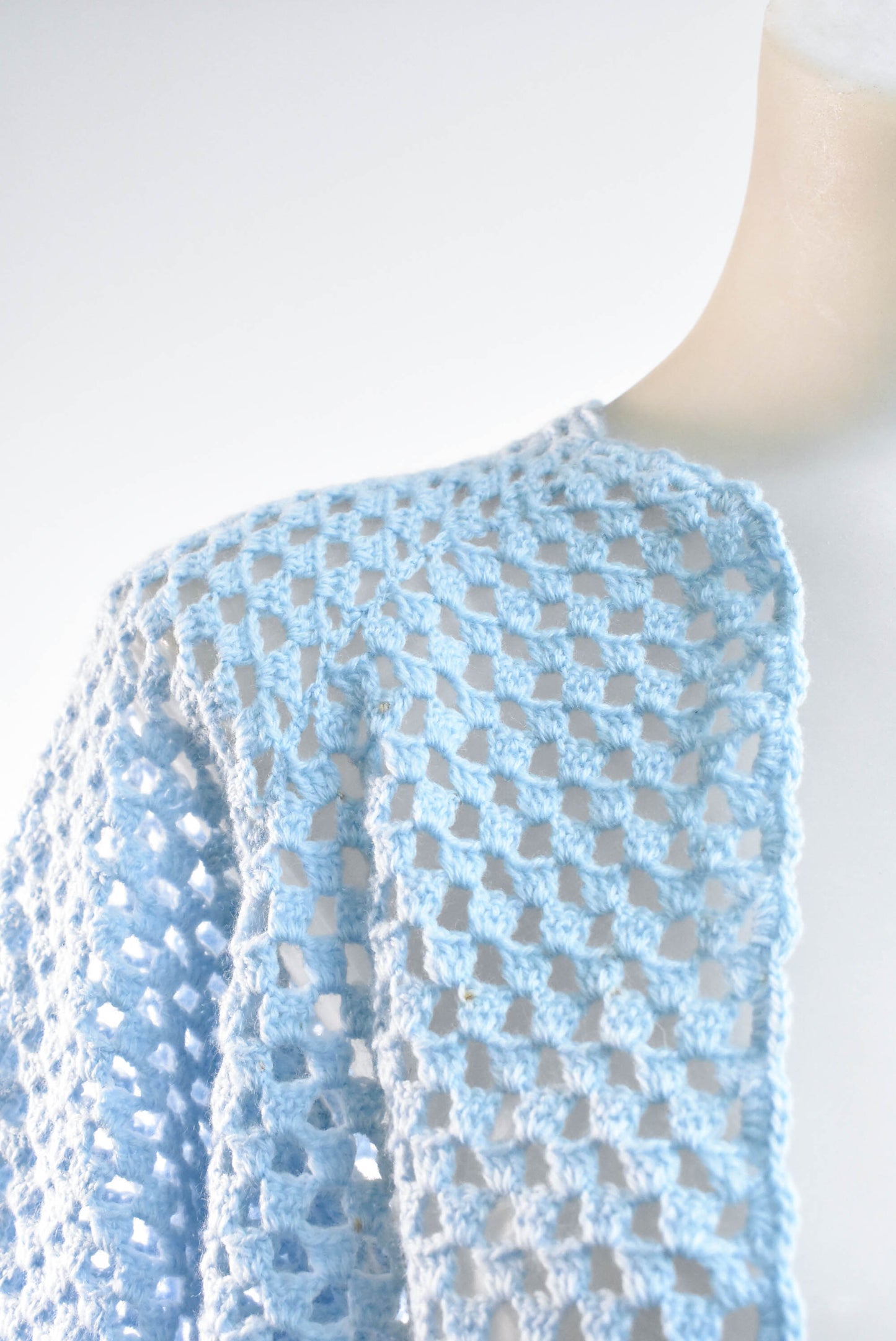 Pale blue crocheted cardigan