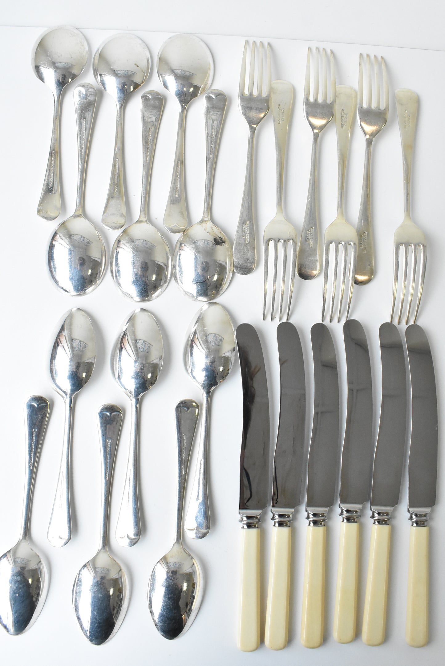 24 piece assorted set of forks, knives, dessert spoons, soup spoons