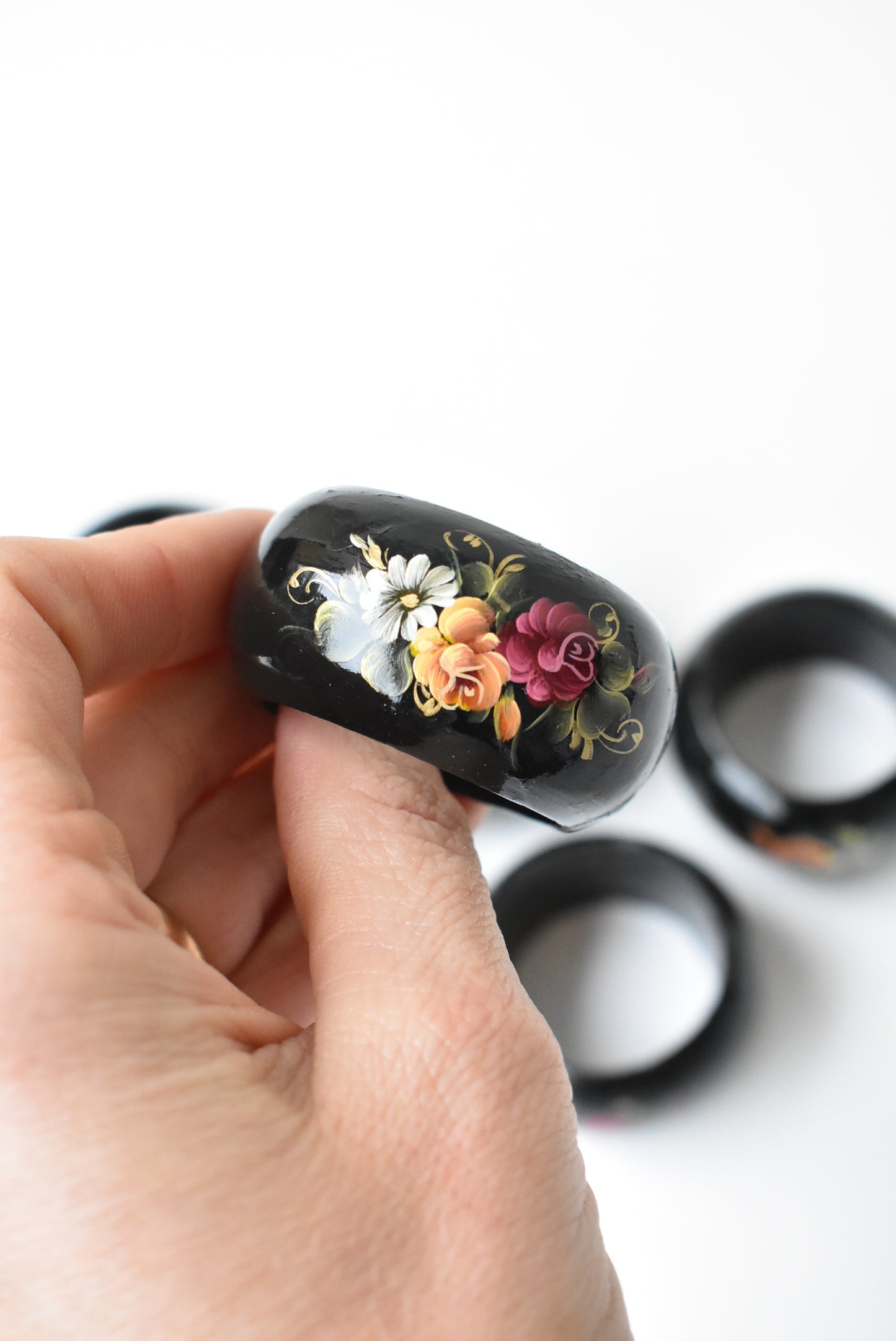 Hand painted and lacquered napkin rings
