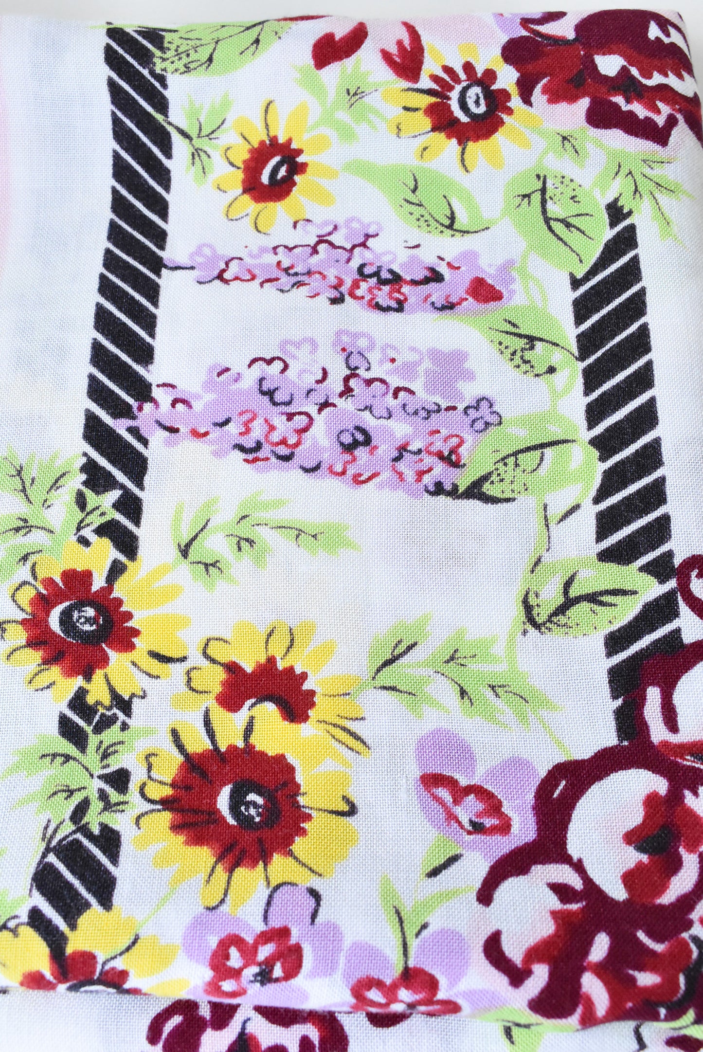 Retro white and maroon floral tablecloth