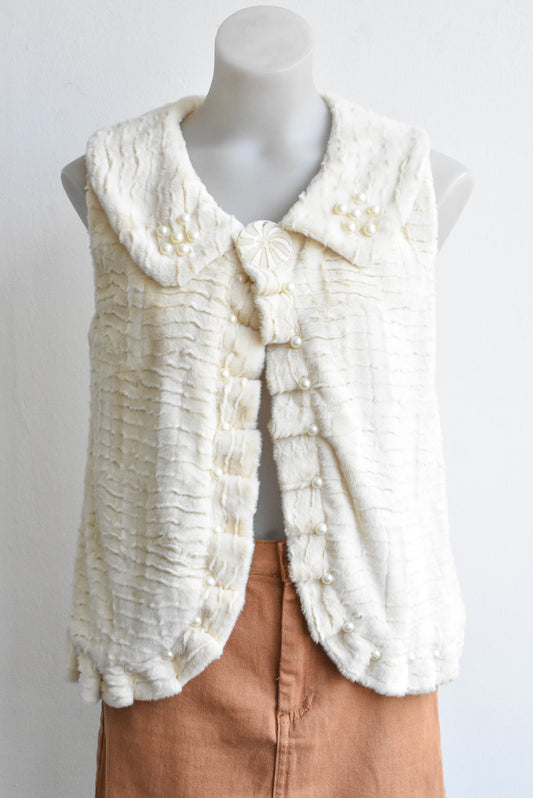 Homemade white faux-fur beaded vest