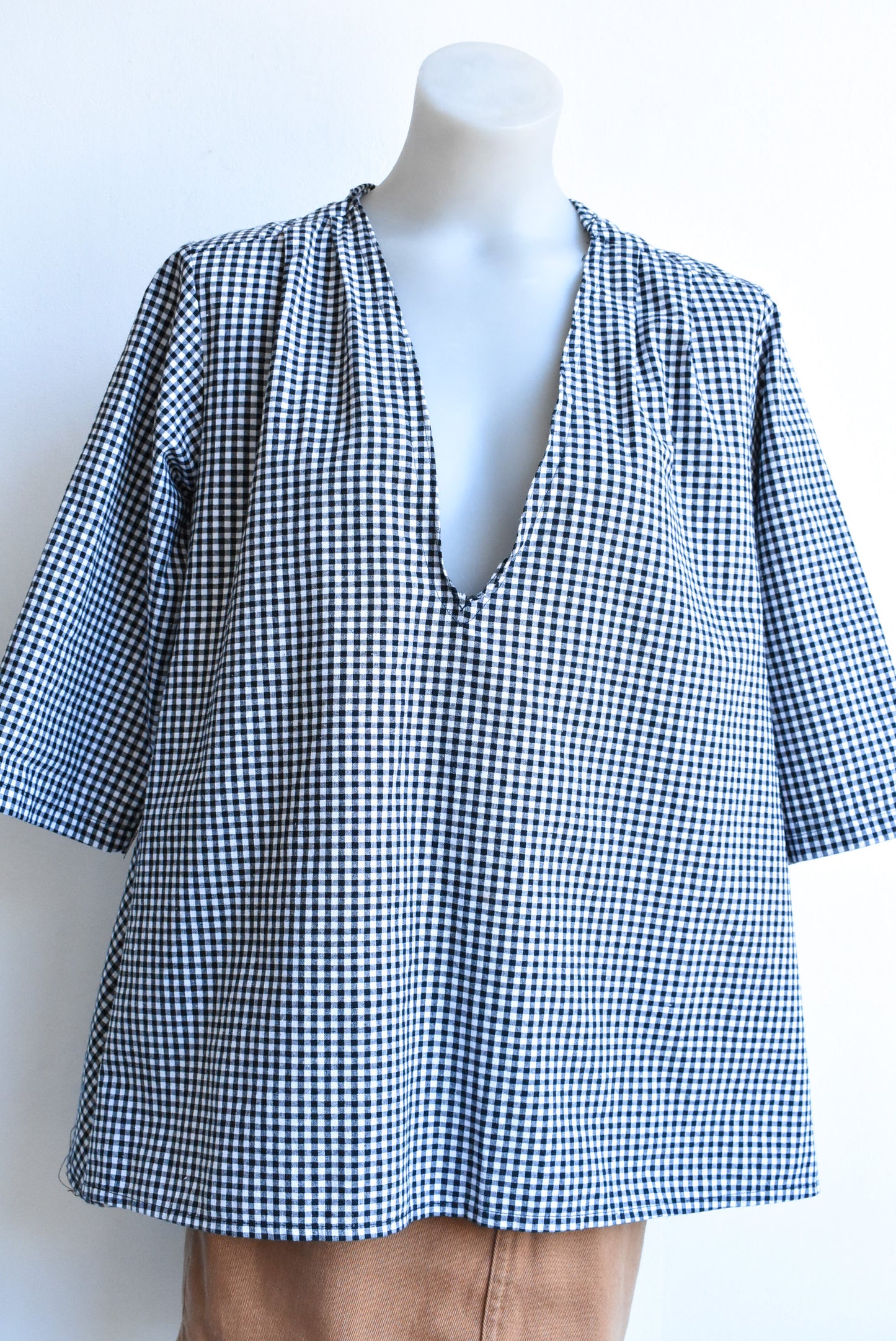 Black and white checked top, size XL