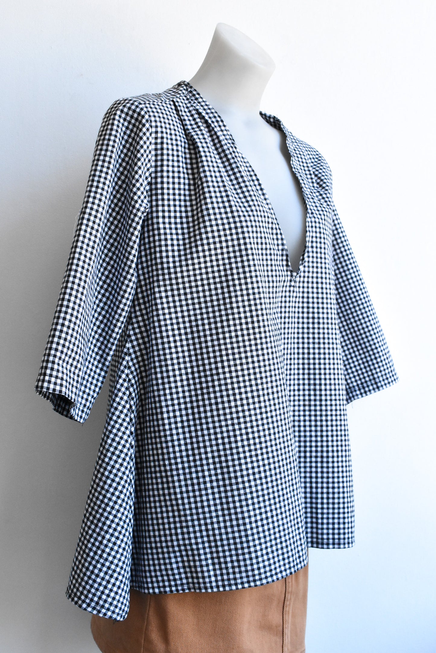 Black and white checked top, size XL