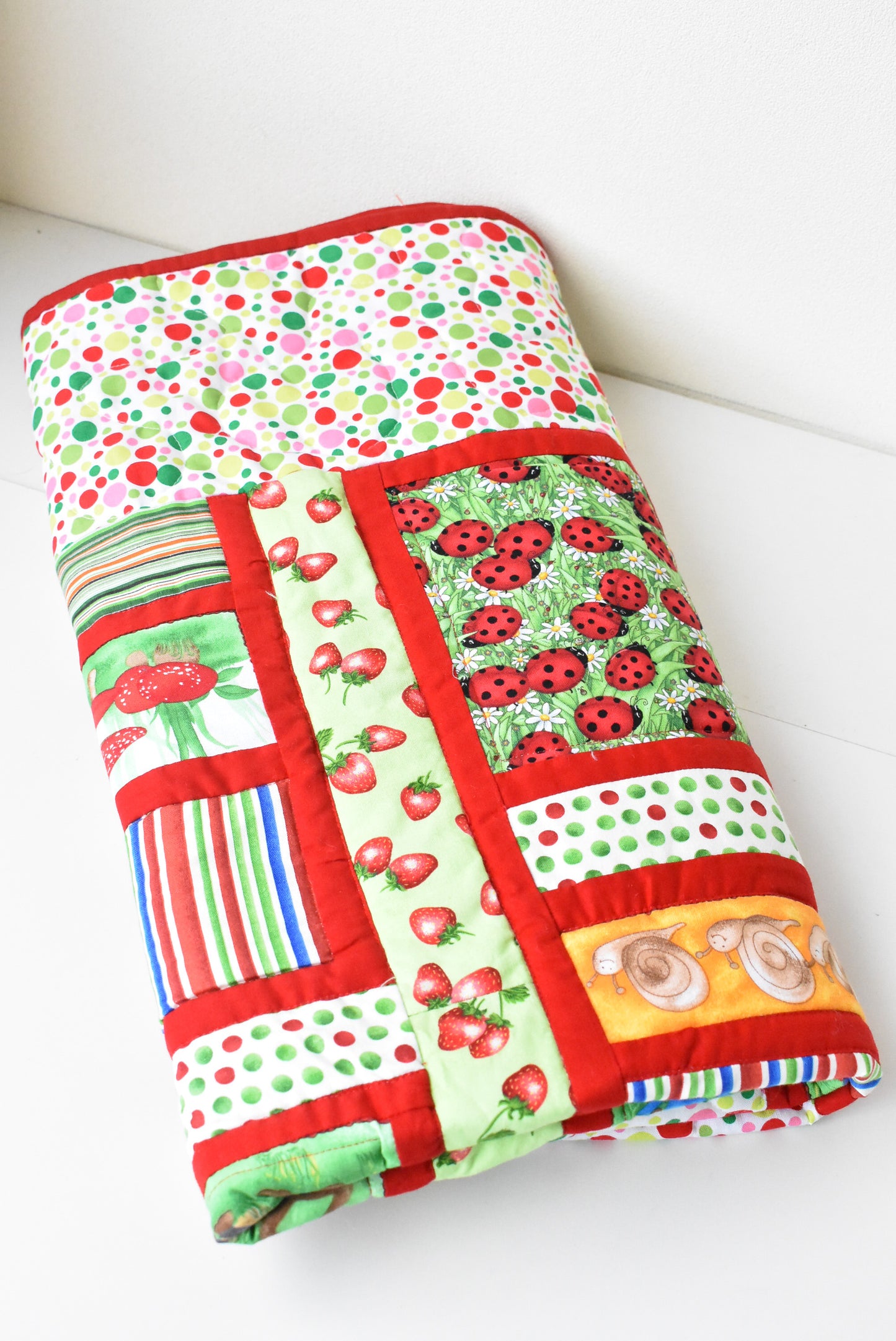 Patchwork quilt with gnomes