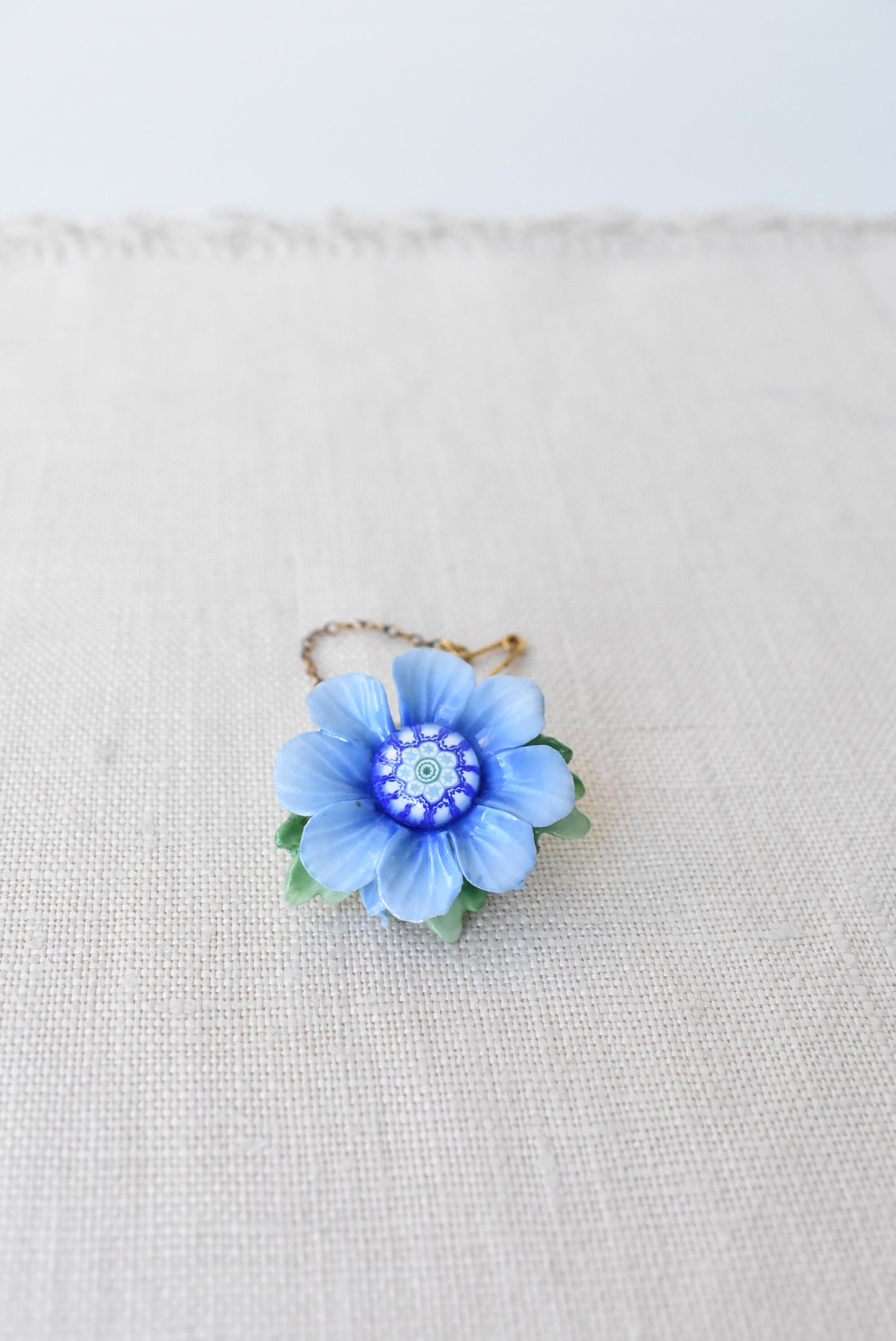 Crown English China and glass blue flower brooch