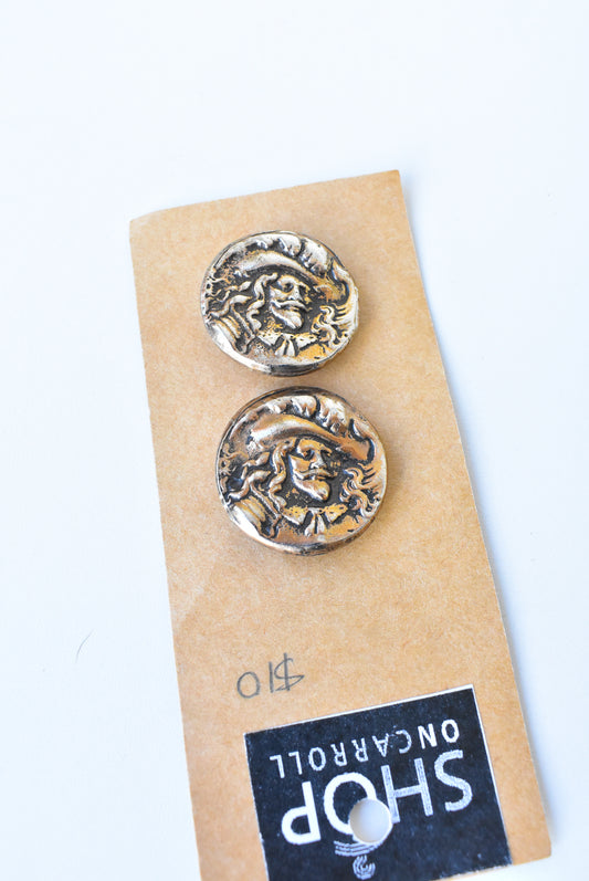 Gold-toned metal musketeer buttons x2